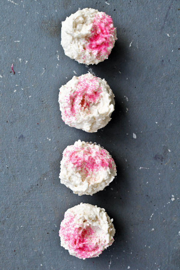 Fresh Strawberry Cupcakes with Coconut Frosting I howsweeteats.com