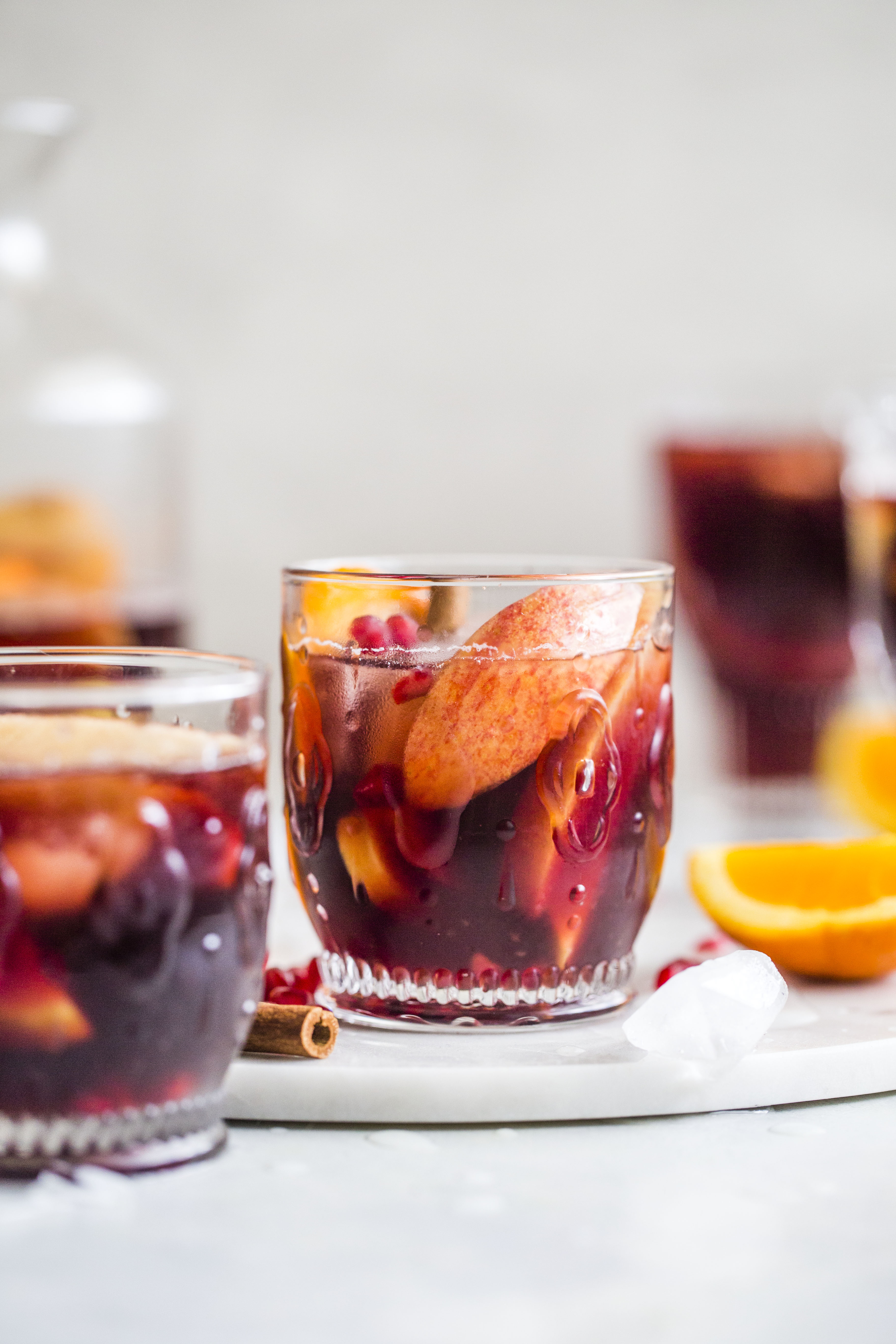 Pomegranate sangria is the best winter sangria ever! It comes in the form of delicious pomegranate vanilla sangria with lots of red wine and brandy. It's perfect for the cooler months and it will warm you right up. I howsweeteats.com #pomegranate #sangria