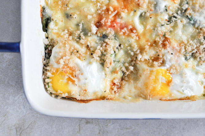 Fontina and Spinach Baked Eggs with Garlic Brown Butter Breadcrumbs I howsweeteats.com