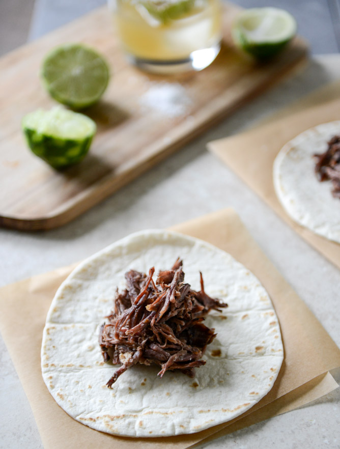 Crockpot Short Rib Tacos with Salted Lime Cabbage and Queso Fresco I howsweeteats.com
