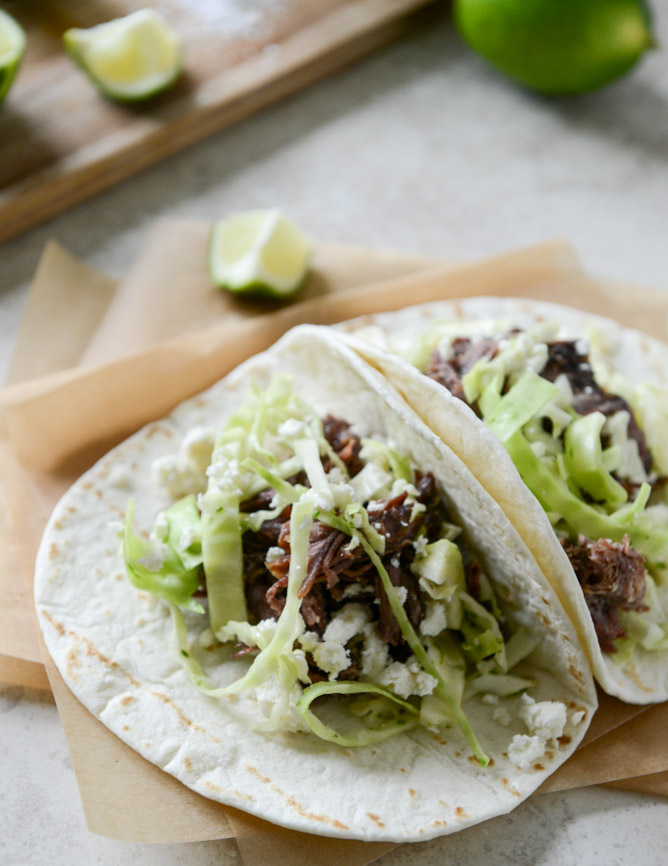 Crockpot Short Rib Tacos with Salted Lime Cabbage and Queso Fresco I howsweeteats.com