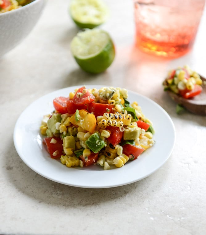 Easy Grilled Corn Tomato Salad with Blue Cheese and Basil Ribbons I howsweeteats.com