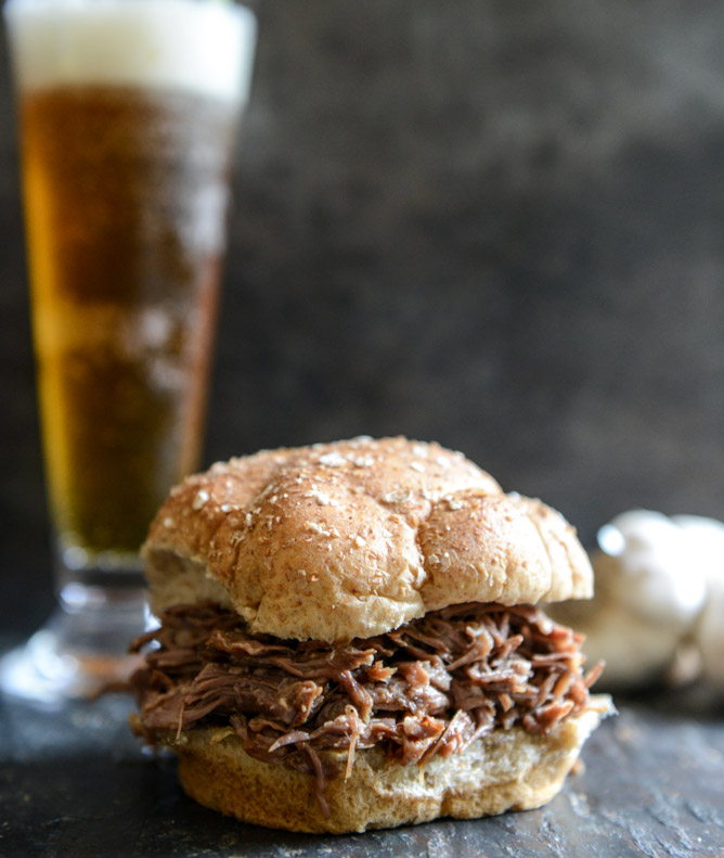 Superbowl Party - crockpot brown sugar + roasted garlic pulled pot roast sandwiches from How Sweet It Is