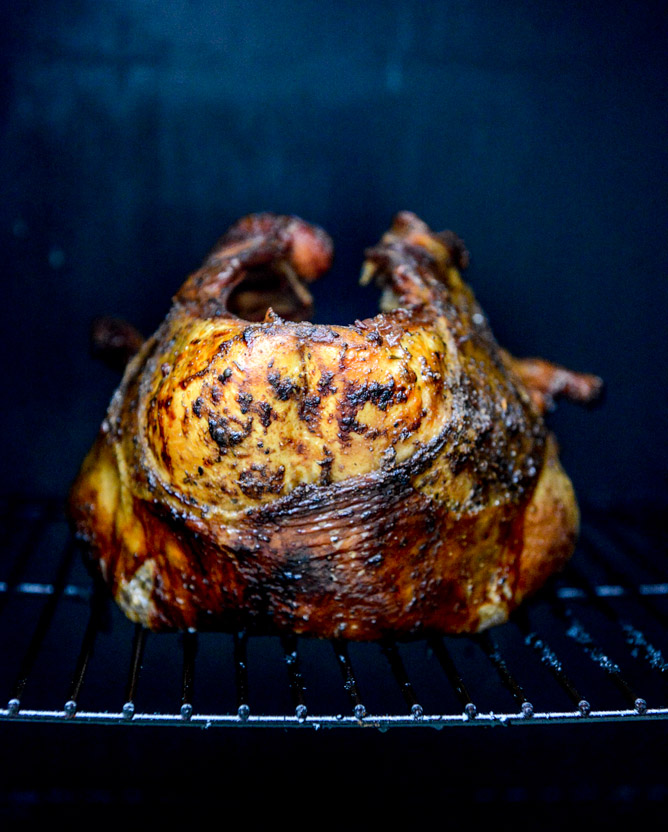 this applewood smoked turkey is prepped with a maple bourbon brine and served with a cider bourbon gravy! I howsweeteats.com