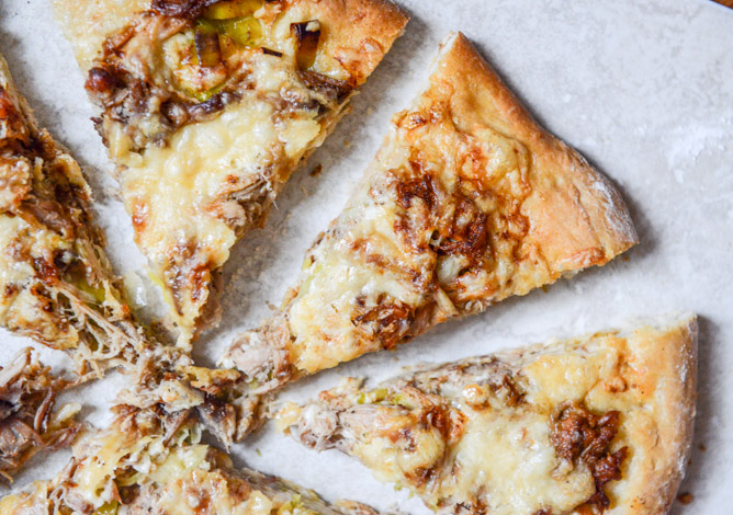 Pulled Pork Pizza with Maple Leeks, Roasted Garlic and Aged Cheddar I howsweeteats.com