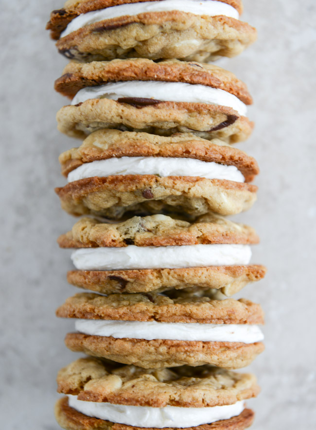Chewy Black + White Chip Oatmeal Sandwich Cookies with Marshmallow Buttercream Filling I howsweeteats.com
