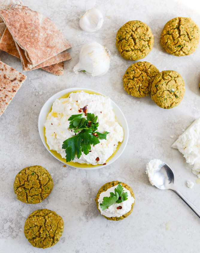 baked falafel with spicy feta dip + 112 different lightened up meal ideas for the new year I howsweeteats.com