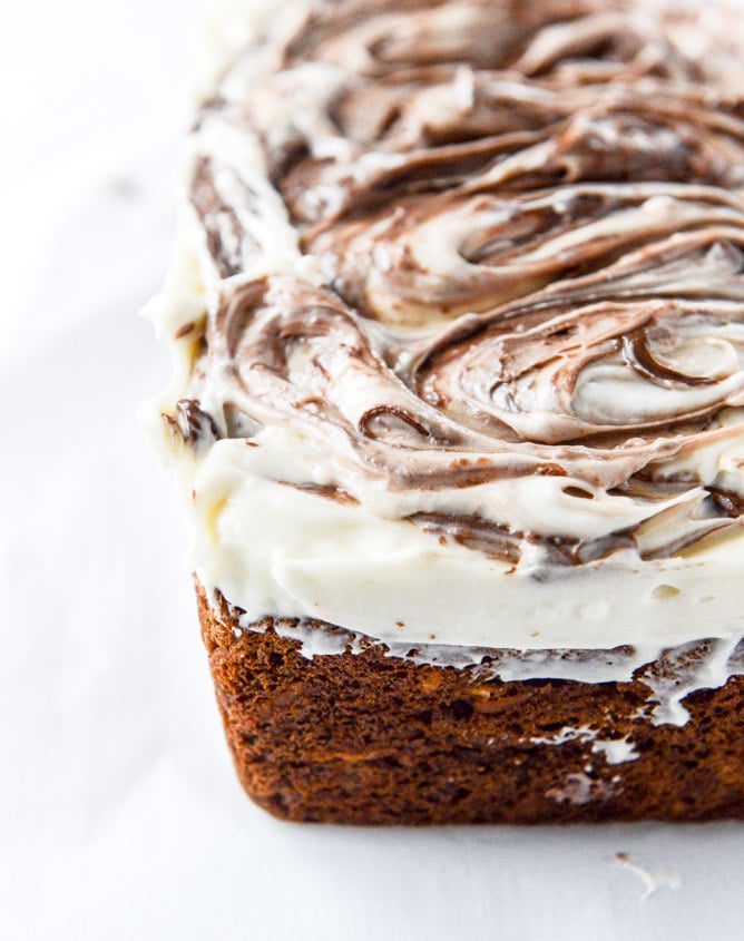 carrot cake cake with nutella swirled cream cheese frosting I howsweeteats.com