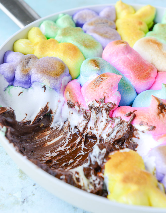 Peeps skillet s'mores! Indoor chocolate peanut butter s'mores using Peeps marshmallows make for the cutest spring treat! Best for using up those Peeps! I howsweeteats.com #peeps #smores