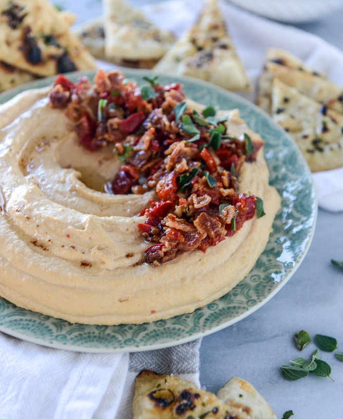 hot bacon cherry pepper hummus with pizza pita chips I howsweeteats.com