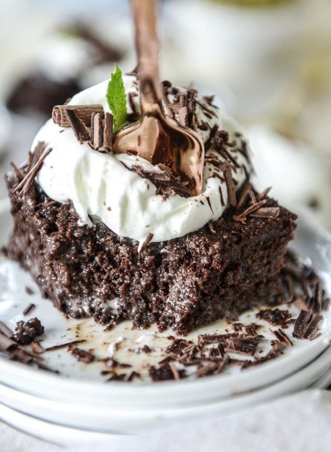 This chocolate tres leches cake is a spin on the classic tres leches. Three milks, one being chocolate milk, soak into the fudgiest cake ever! I howsweeteats.com