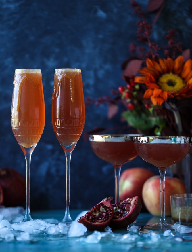 pomegranate cider mimosas with a salted caramel rim I howsweeteats.com #cocktails #thanksgiving #applecider #mimosas