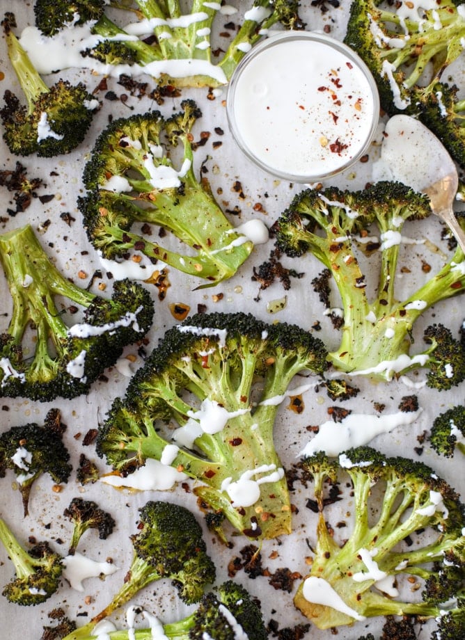 best roasted broccoli with goat cheese drizzle I howsweeteats.com #broccoli #roasted #goatcheese #spicy #lemon