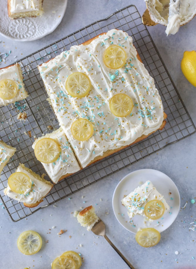 lemon sheet cake with cream cheese frosting I howsweeteats.com #lemon #cake #sheetcake #dessert #creamcheesefrosting