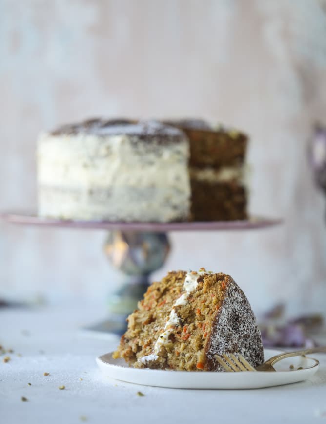 pistachio carrot cake with cream cheese frosting I howsweeteats.com #carrotcake #pistachio #cake #creamcheese #frosting