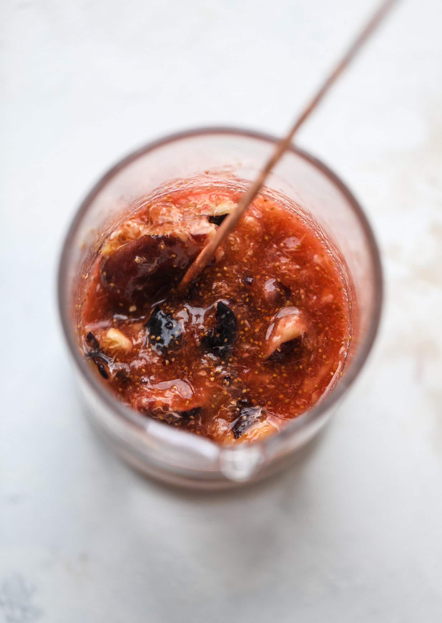 This new fig cocktail is so delicious and perfect for your fresh juicy figs! Muddle the fresh figs with brown sugar and a touch of lemon, then add them to a glass with crushed ice and pour some bubbly on top. I love Prosecco, but you can use a sweeter bubbly too! I howsweeteats.com #fig #cocktail #brown #sugar #prosecco
