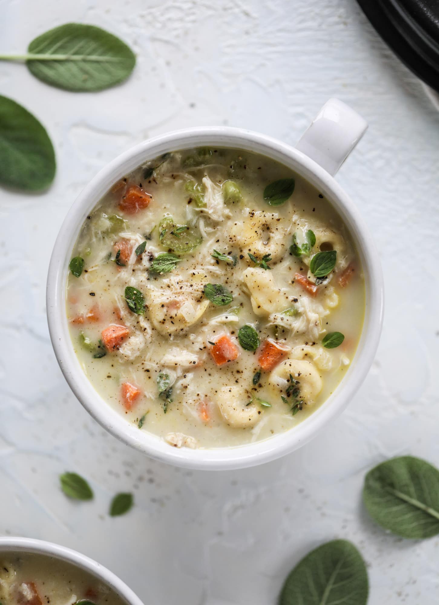 This creamy chicken tortellini soup is the perfect weeknight meal! It comes together quickly and is a great meal to use up a rotisserie chicken. It's satisfying and hearty, with tortellini replacing egg noodles for the pasta. Comfort food perfection! I howsweeteats.com #chicken #soup