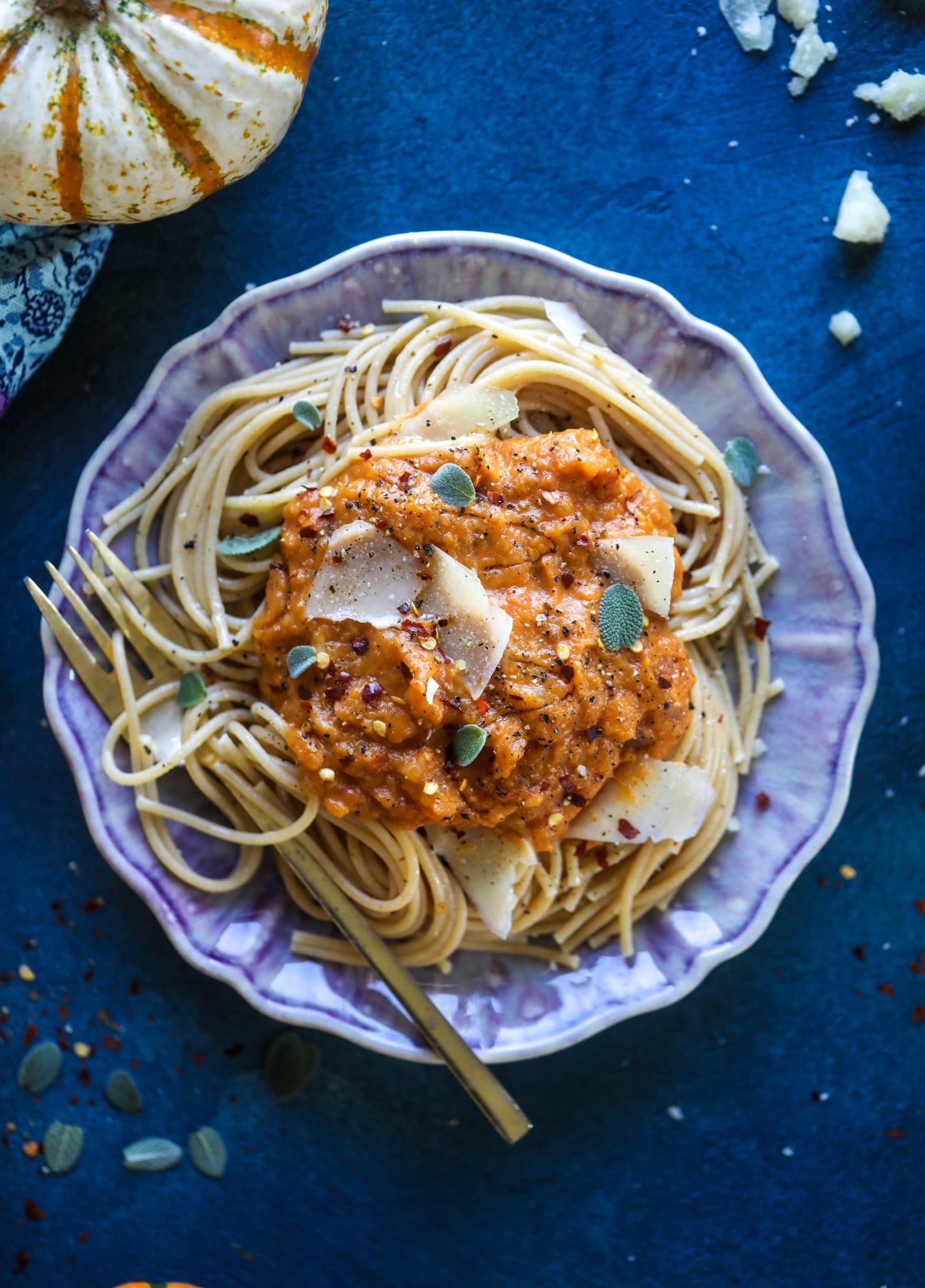 This butternut squash pasta sauce is heaven for an October dinner! Fire roasted tomatoes, butternut squash, pumpkin, sage, spice and parmesan all come together to create a delicious, simmered pot of sauce to blanket your favorite pasta! I howsweeteats.com #butternut #squash #pasta #sauce