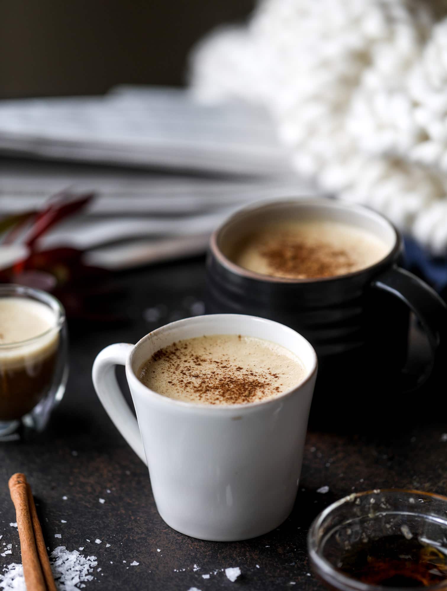This salted maple power coffee is the perfect creamy pick-me up. Maple syrup, coconut butter and sea salt are blended with hot coffee to make the most deliciously whipped hot, frothy latte-like drink, without any dairy! I howsweeteats.com #coffee #coconutbutter