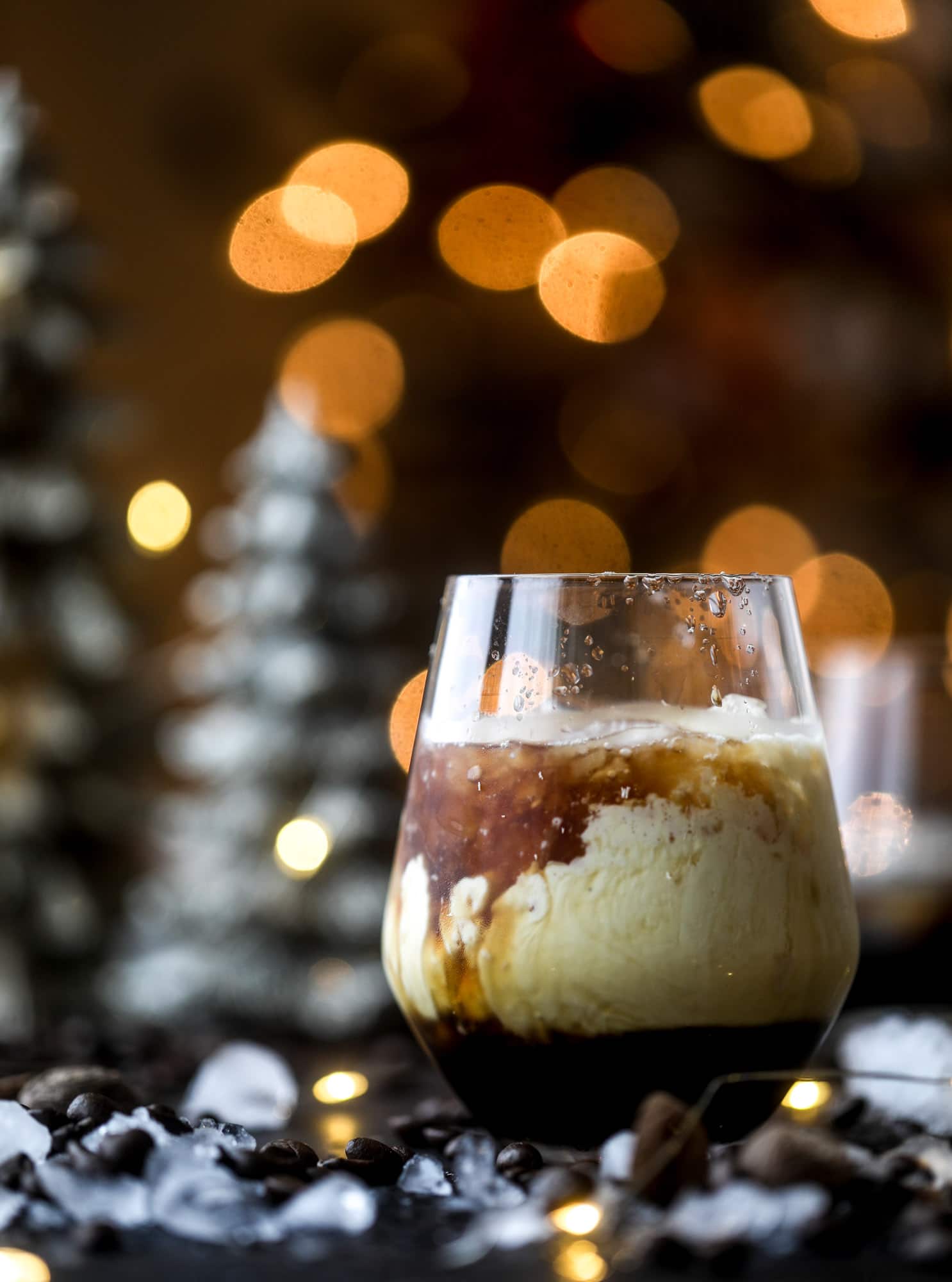 The eggnog white russian cocktail is perfect for the holiday season! Coffee liqueur mixed with vanilla vodka and eggnog and topped with freshly grated nutmeg is the perfect treat and oh-so festive! I howsweeteats.com #eggnog #whiterussian
