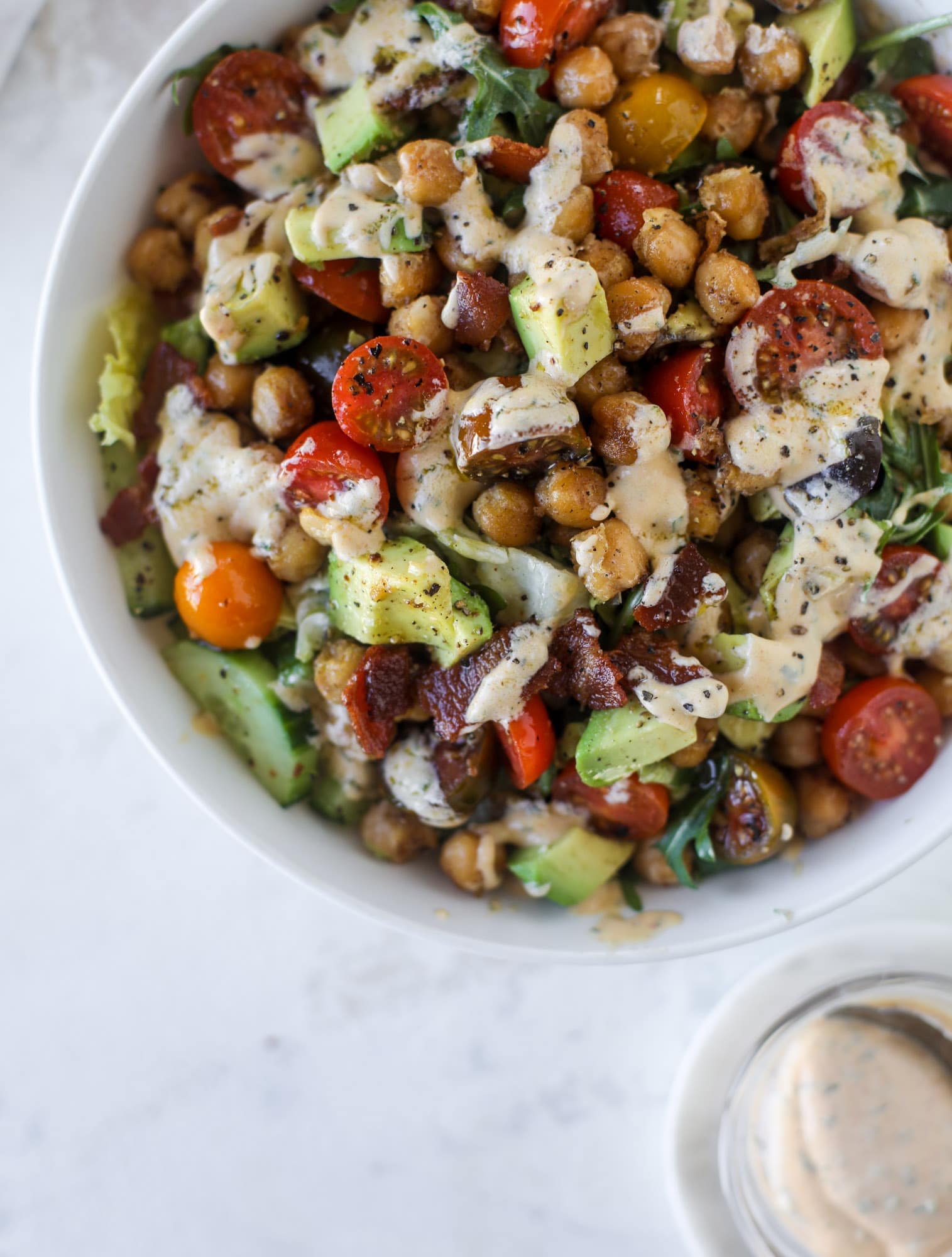The chickpea bacon ranch salad has a ton of crispy, crunchy texture and flavor. It's satisfying and super easy to prep ahead of time too! I howsweeteats.com #chickpea #salad