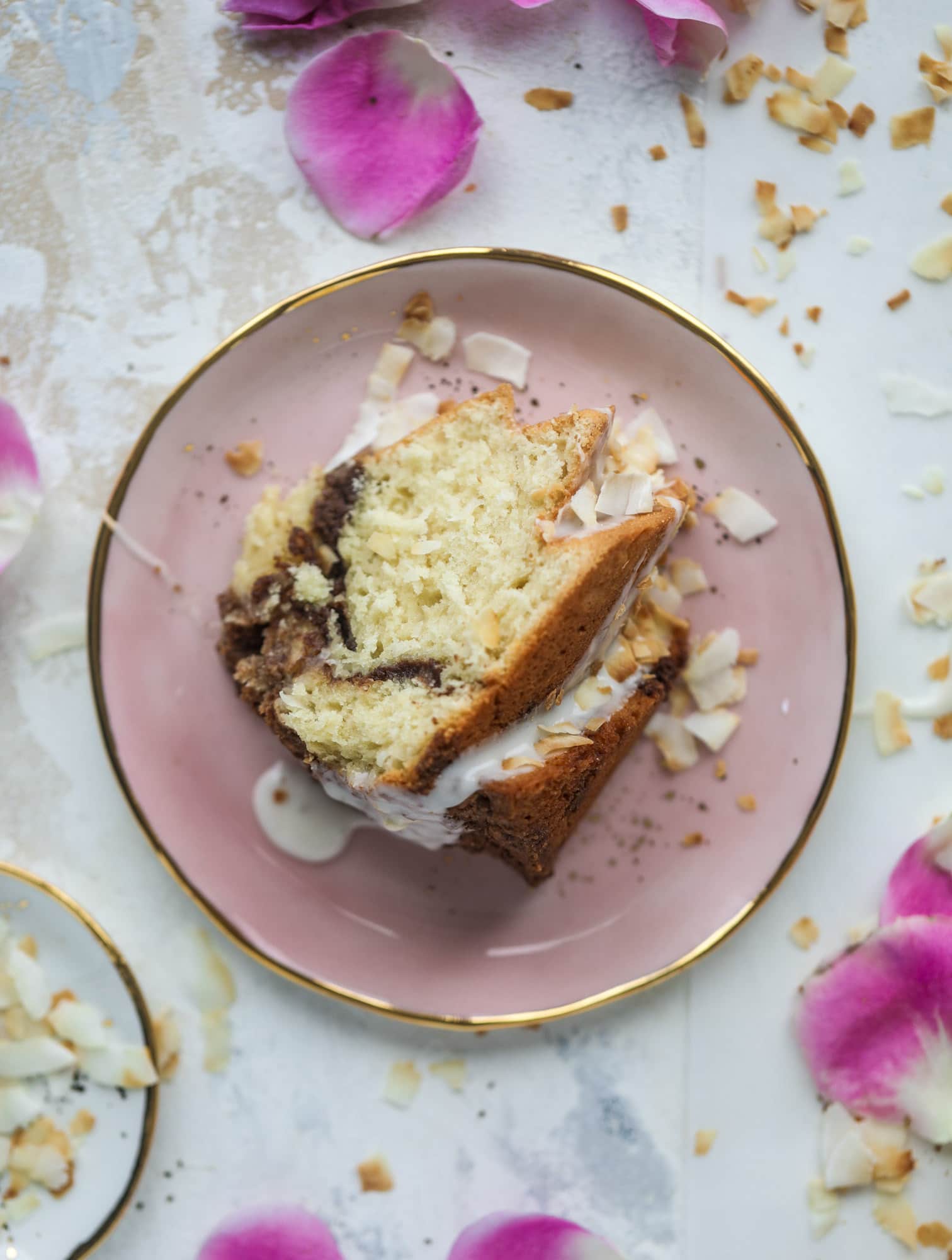 Make breakfast and brunch better with coconut coffee cake! Tender coconut cake with a cocoa sugar streusel and a coconut glaze. To die for!