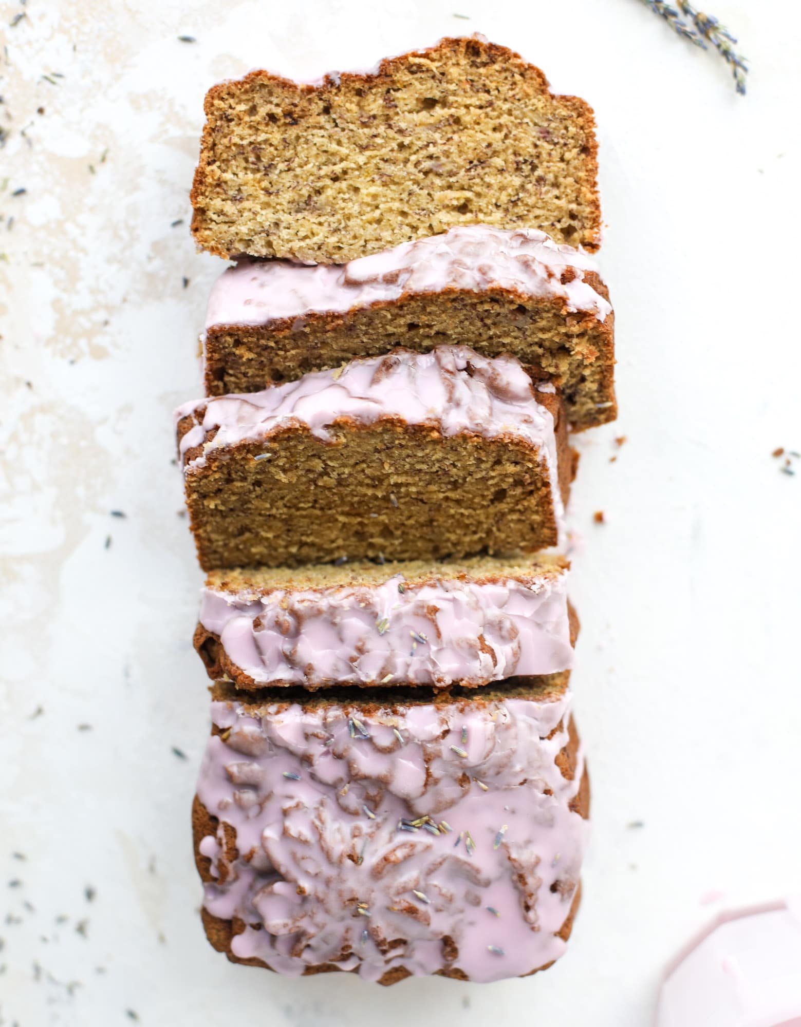 This lavender banana bread is a fresh, modern spring spin on the classic! The light flavor of lavender gives this banana bread a whimsical twist. I howsweeteats.com #lavender #bananabread