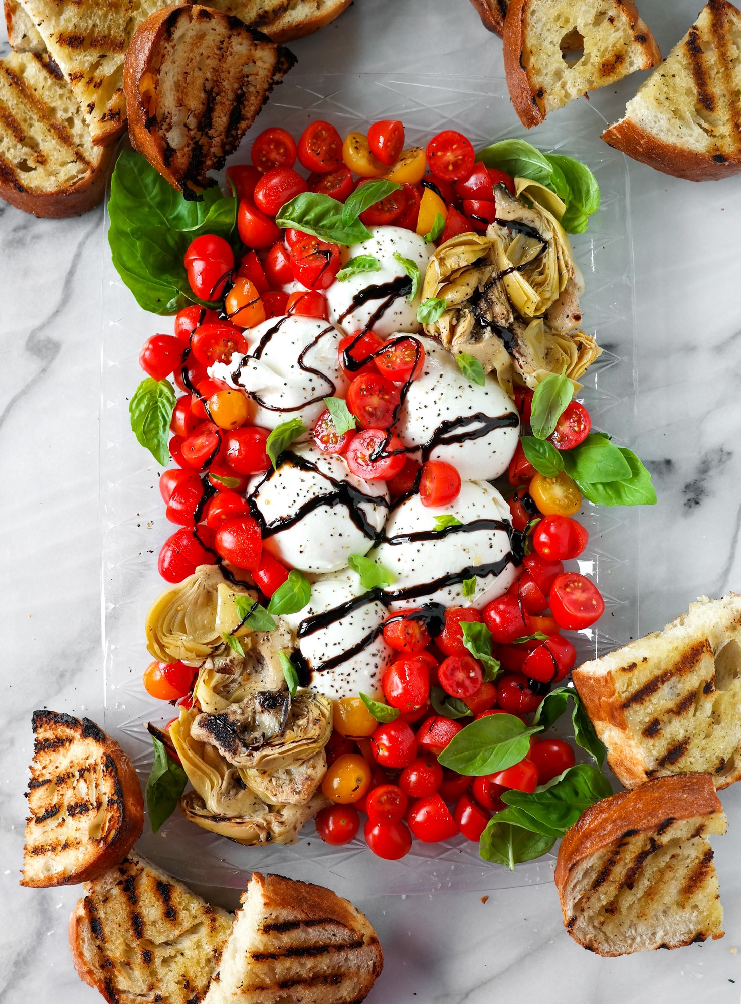 summer burrata plate with tomatoes and grilled bread