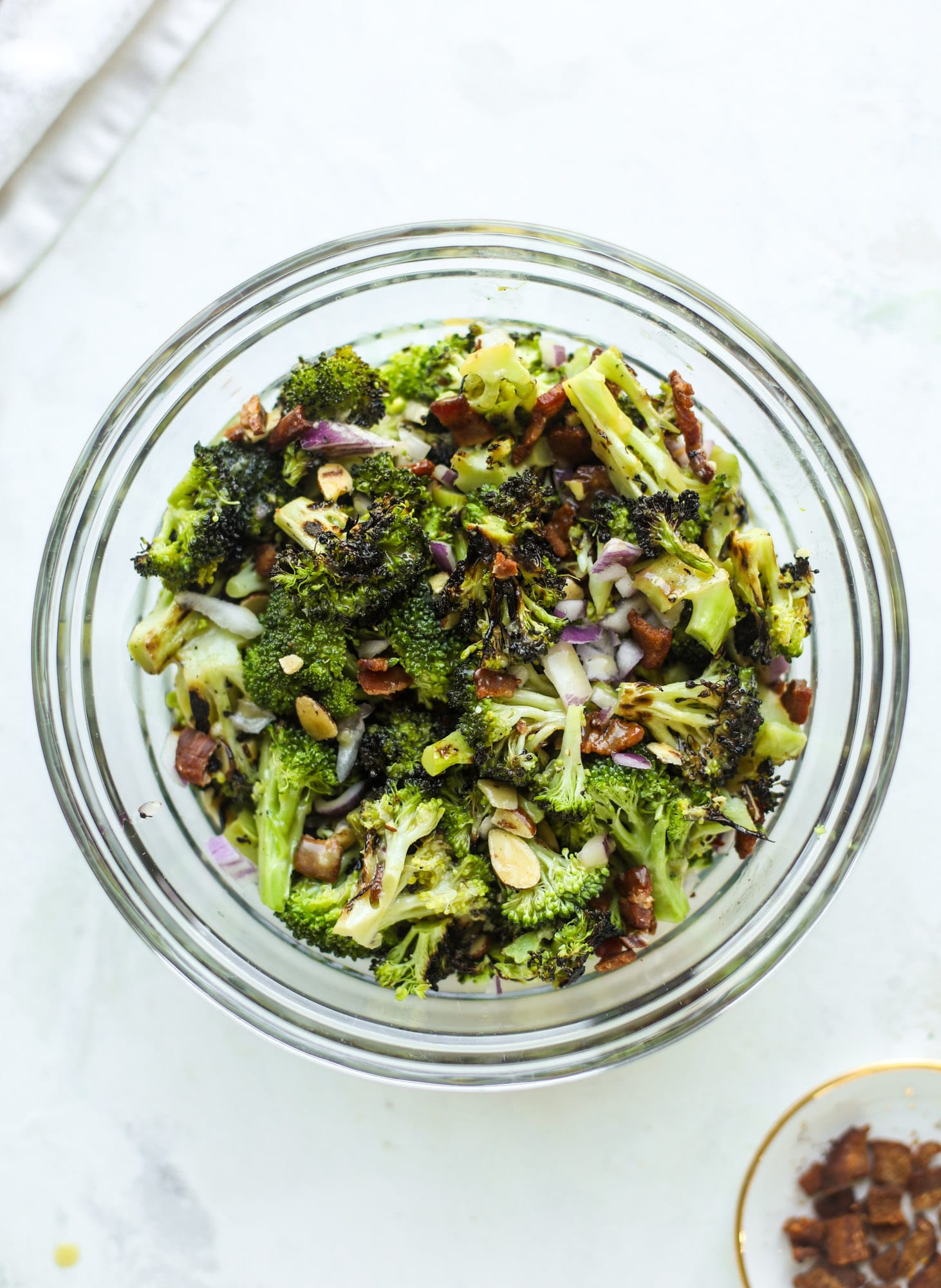 My favorite broccoli salad is here! This broccoli crunch salad is full of grilled broccoli, sliced almonds, diced scallions and crunchy bacon. It's so good!