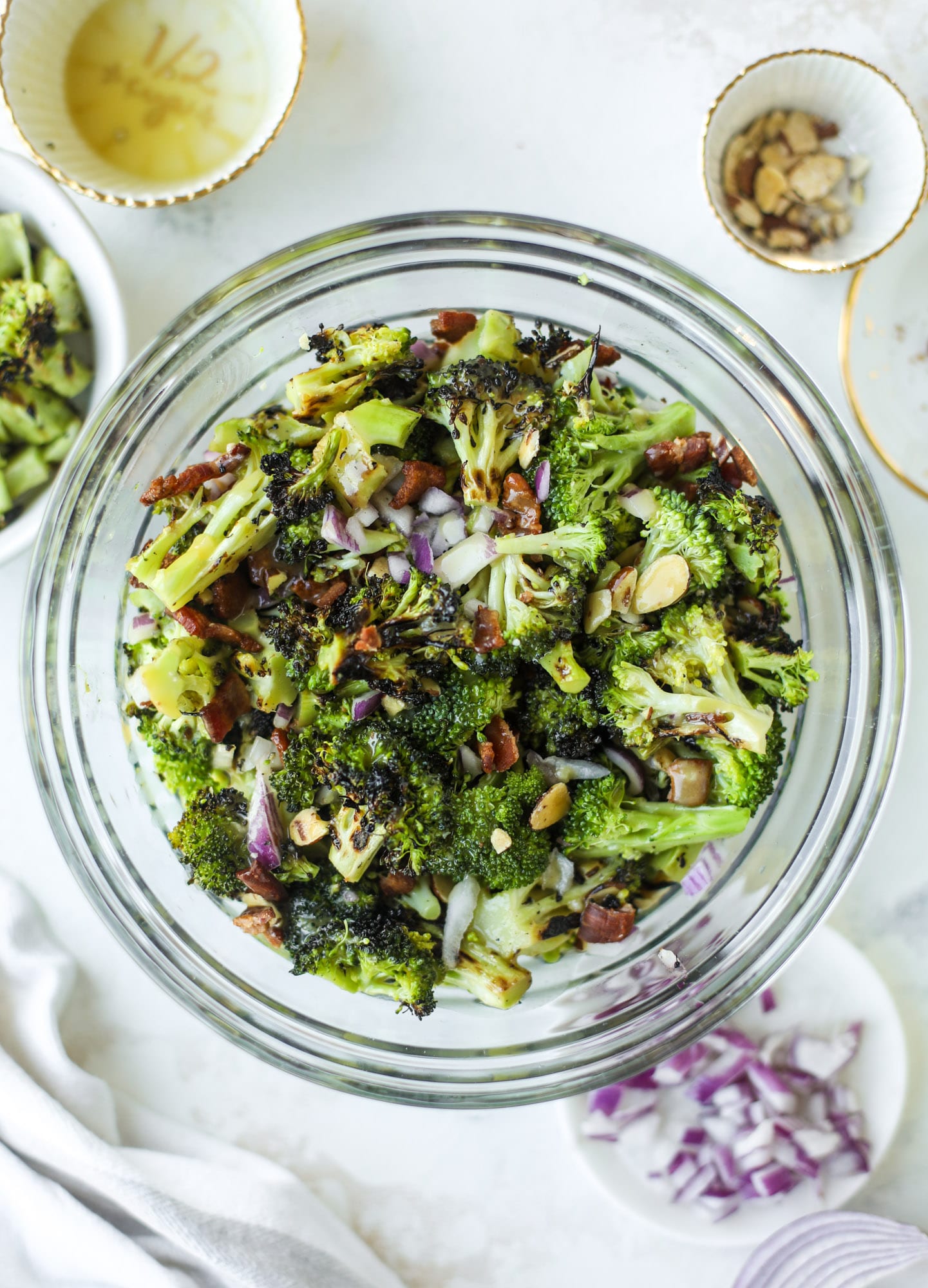 My favorite broccoli salad is here! This broccoli crunch salad is full of grilled broccoli, sliced almonds, diced scallions and crunchy bacon. It's so good!