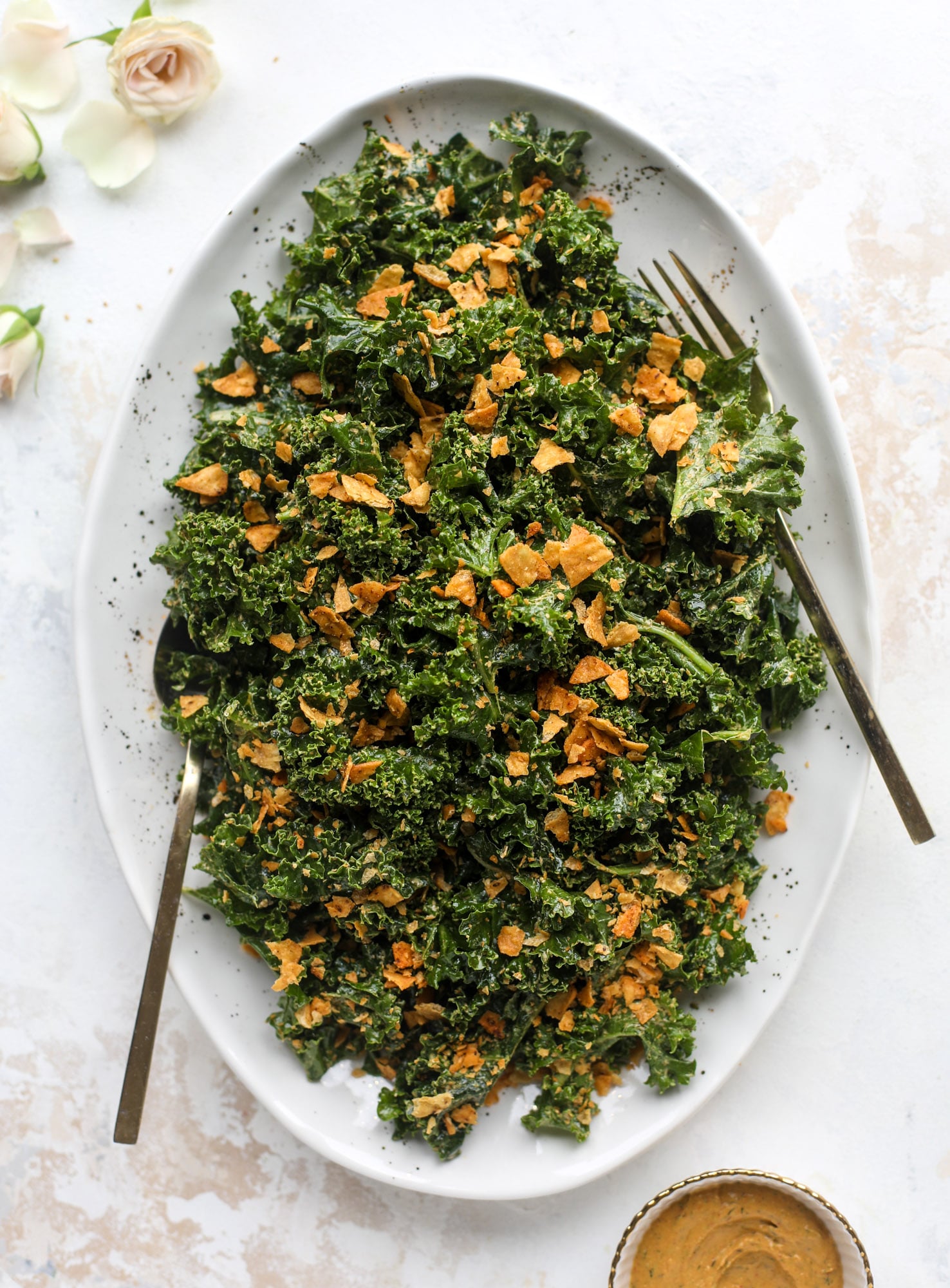 This cool ranch kale salad is loaded with all the flavor of our favorite chips. Simple enough to serve with almost everything, it's ridiculously flavorful!