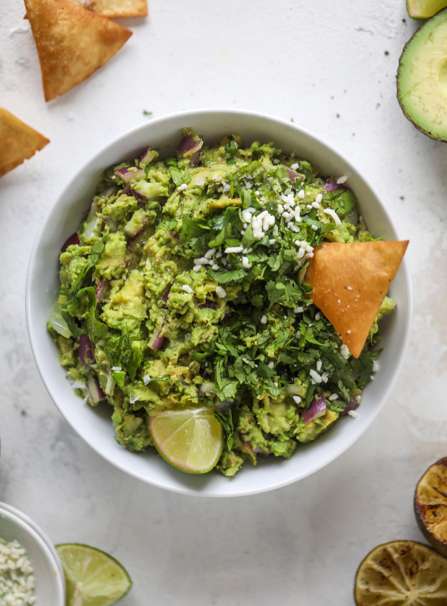 Take your guac up a notch by grilling the ingredients! This grilled guacamole is smoky and flavorful and just begging for all the chips.