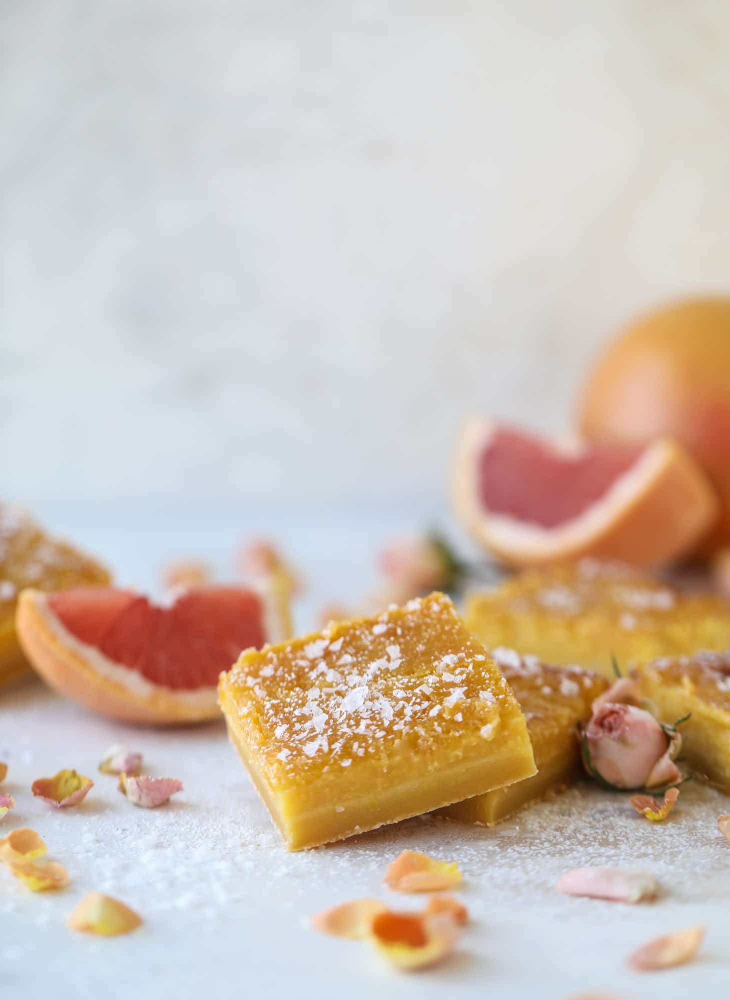These salted citrus bars are made of both grapefruit and lemon curd on a buttery shortbread crust. Top with flaked sea salt for the perfect bite!
