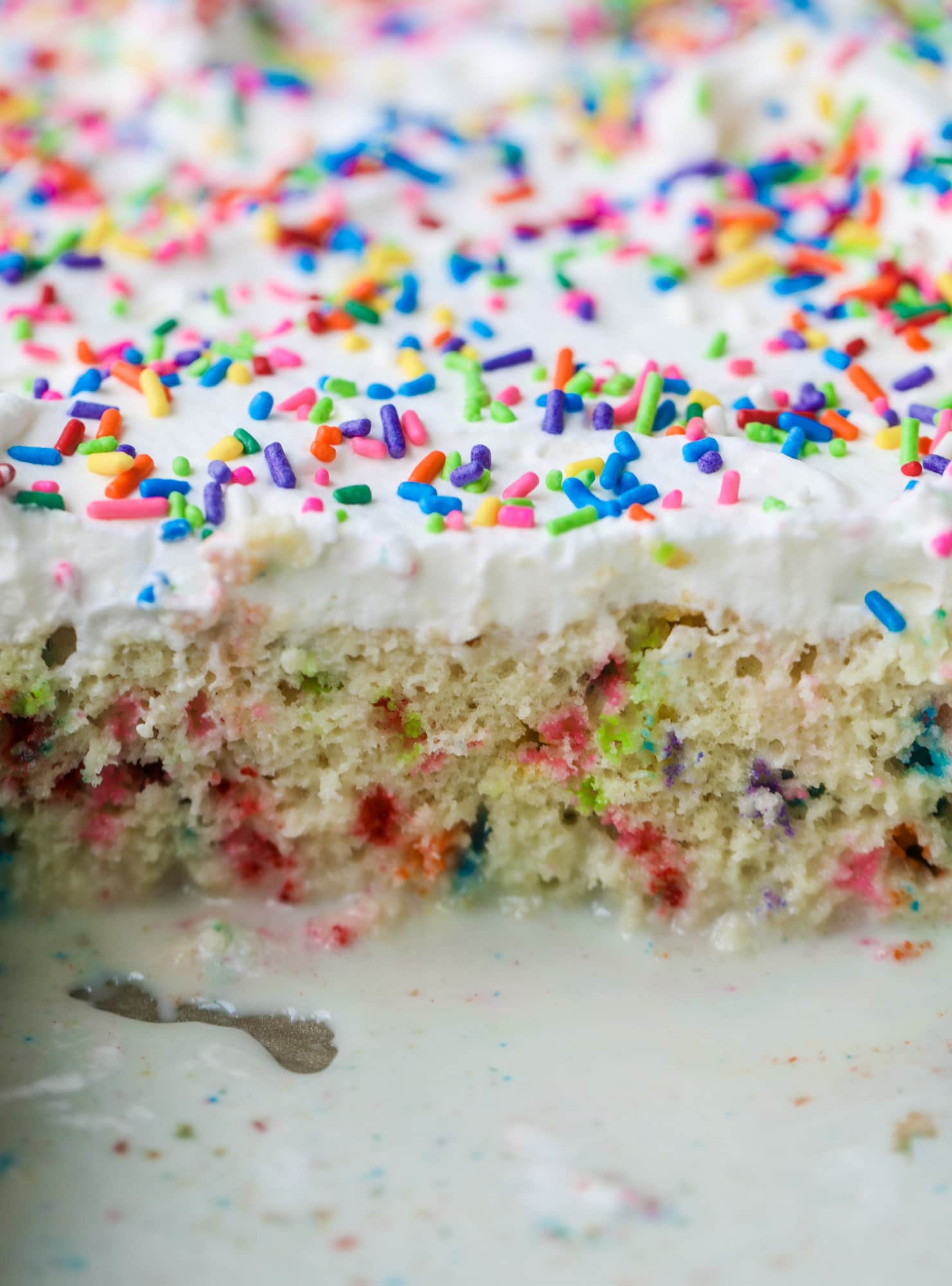 A sprinkled twist on the classic tres leches! Tres leches confetti cake is full of rainbow sprinkles and tastes like heaven. So easy to make!