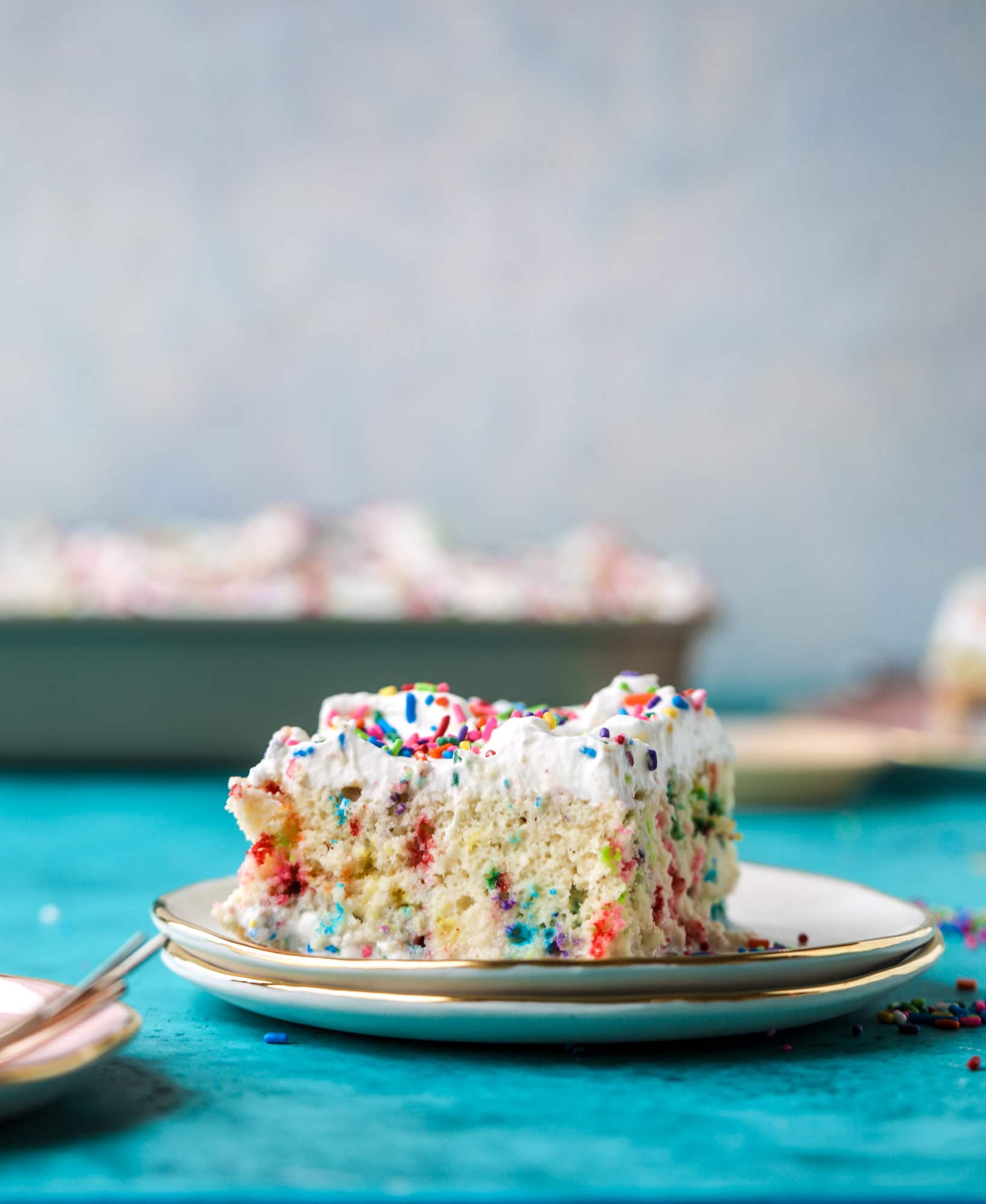 A sprinkled twist on the classic tres leches! Tres leches confetti cake is full of rainbow sprinkles and tastes like heaven. So easy to make!