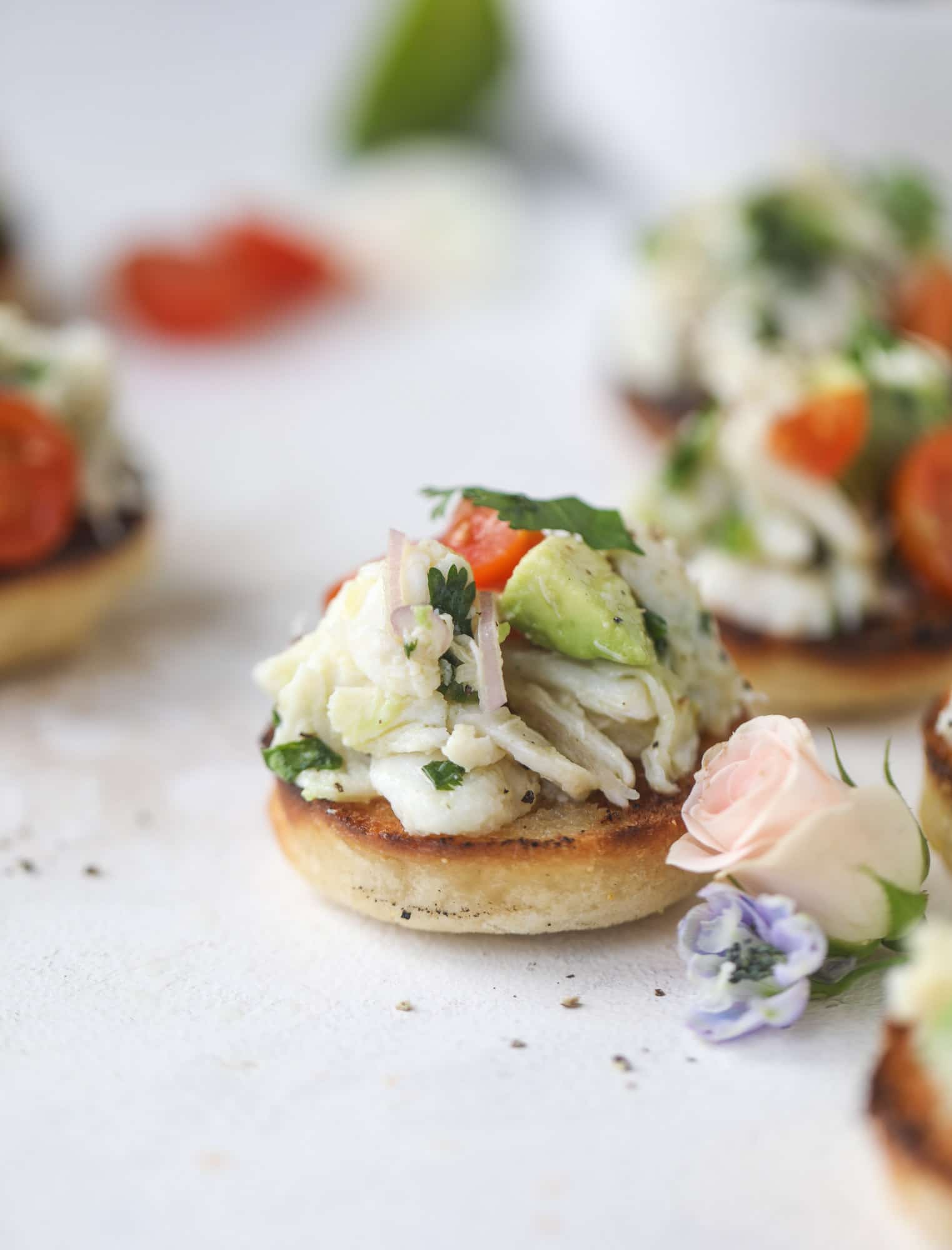 The cutest crab salad toasts are perfect for a snack, appetizer or light meal with a greens salad. This avocado crab salad is so refreshing and light!