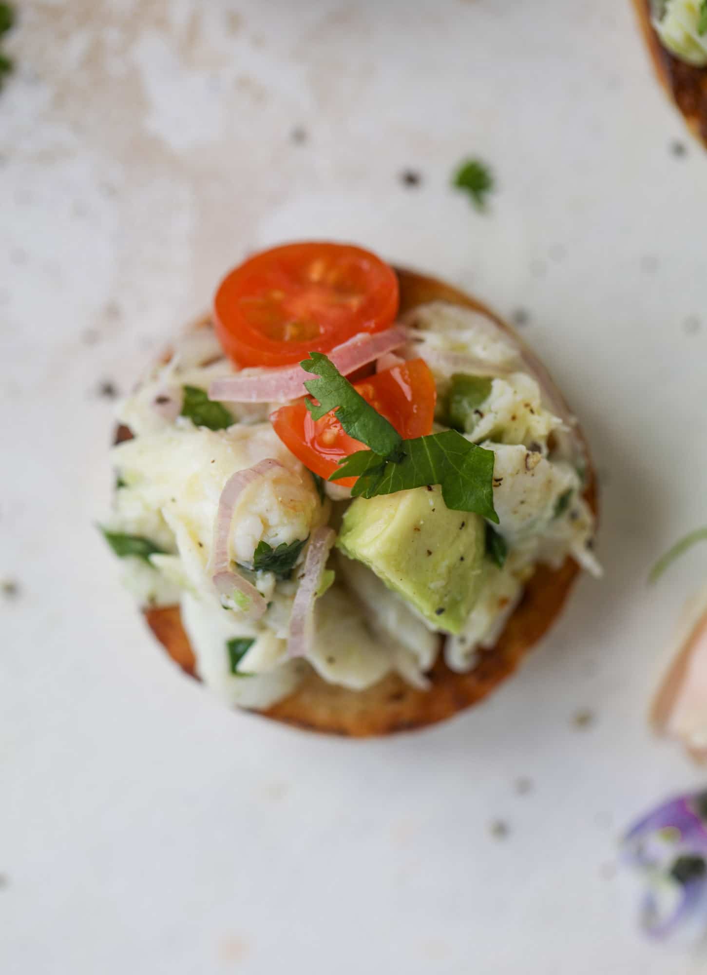 The cutest crab salad toasts are perfect for a snack, appetizer or light meal with a greens salad. This avocado crab salad is so refreshing and light!