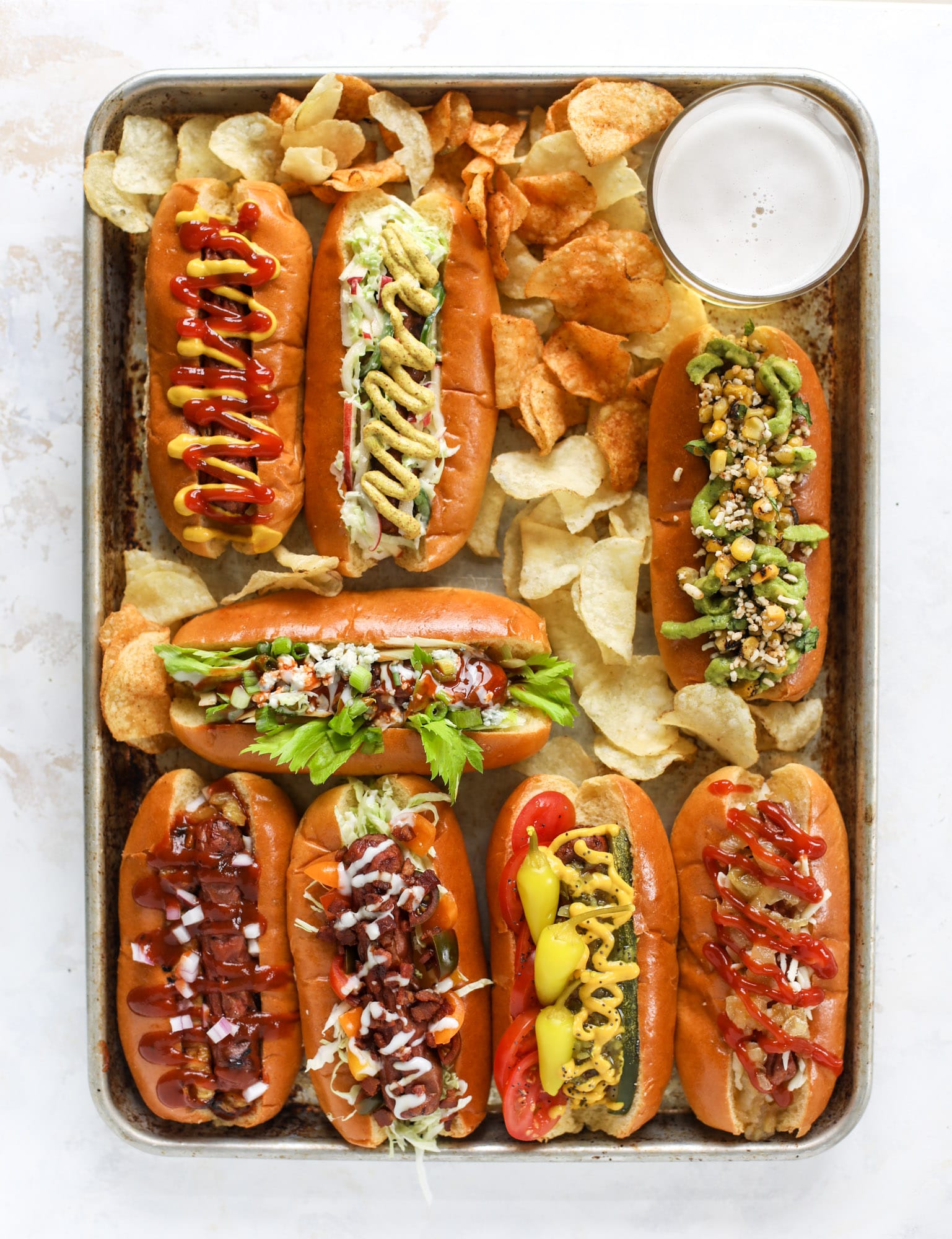 Nothing screams summer more than a hot dog bar! Grab your buns and dogs and a whole lot of toppings. This is super fun and delicious!