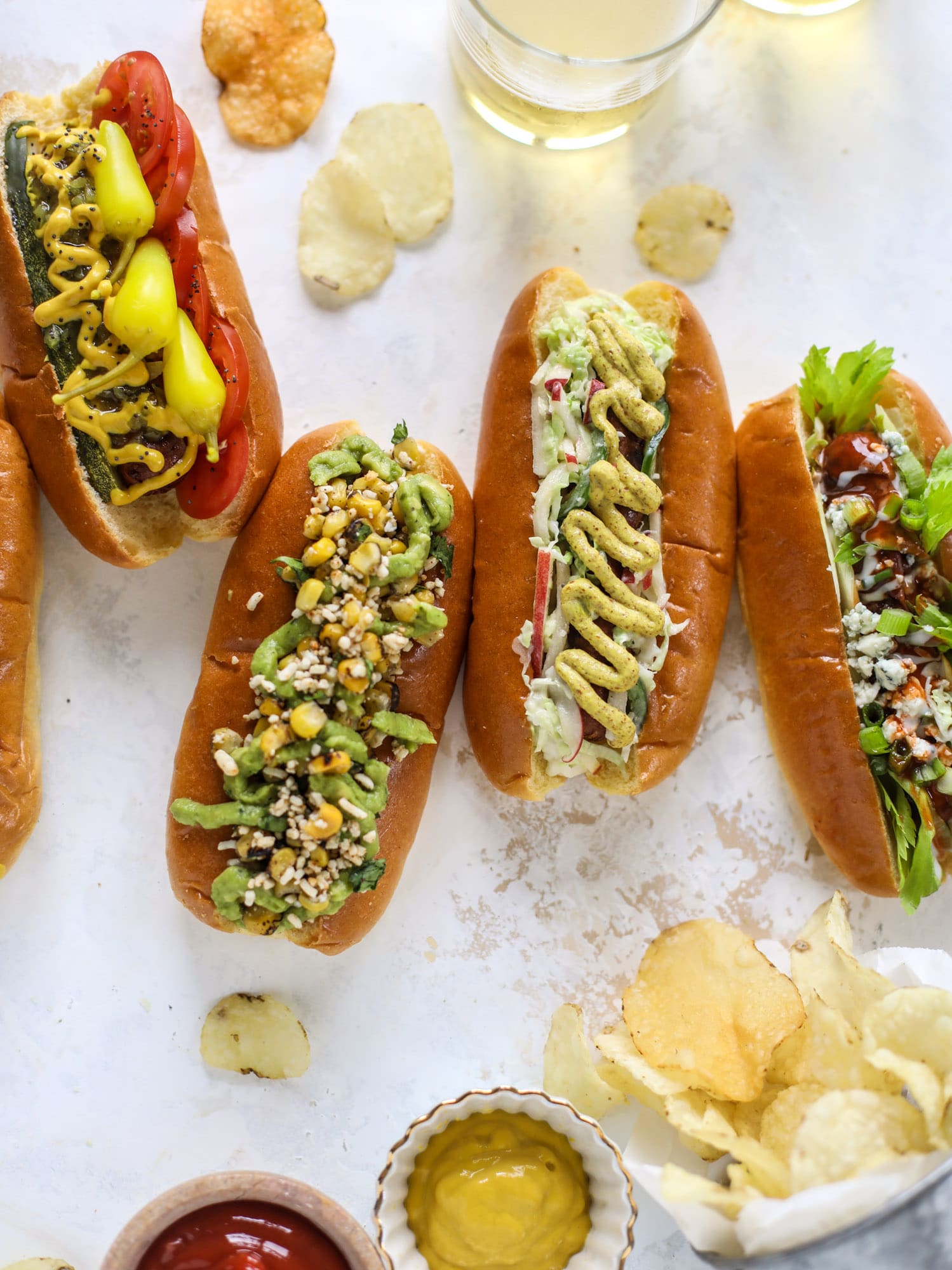 Nothing screams summer more than a hot dog bar! Grab your buns and dogs and a whole lot of toppings. This is super fun and delicious!
