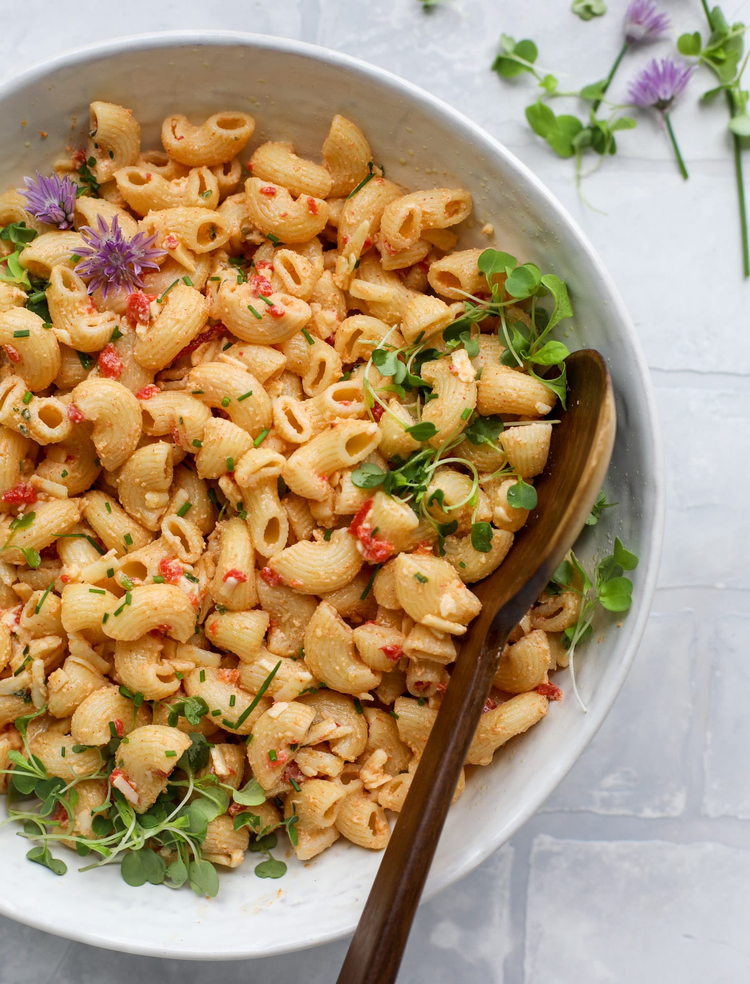 This pimento cheese pasta salad is the perfect summer side dish! All the flavor of pimento cheese and all the comforts of pasta salad, in one bowl!