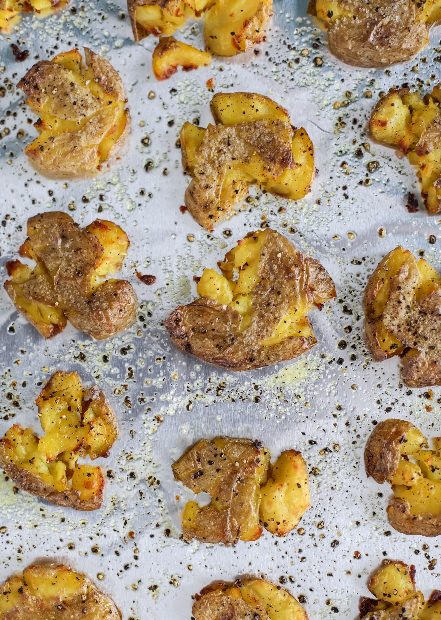 This is our favorite side dish ever! Crispy smashed potatoes roasted in the oven to perfection. Serve them with a dipping sauce or as a side dish!
