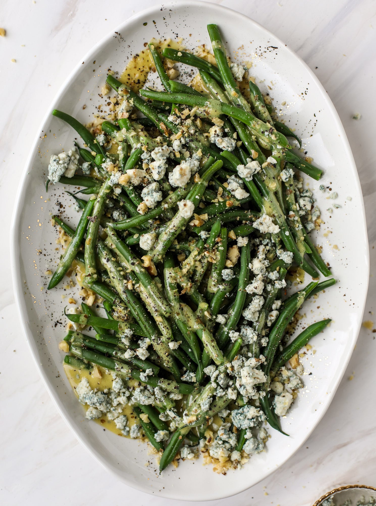 This fresh green bean salad is the ultimate summer side dish. Crisp green beans, creamy blue cheese, chopped walnuts and a dijon dressing. It's beyond!