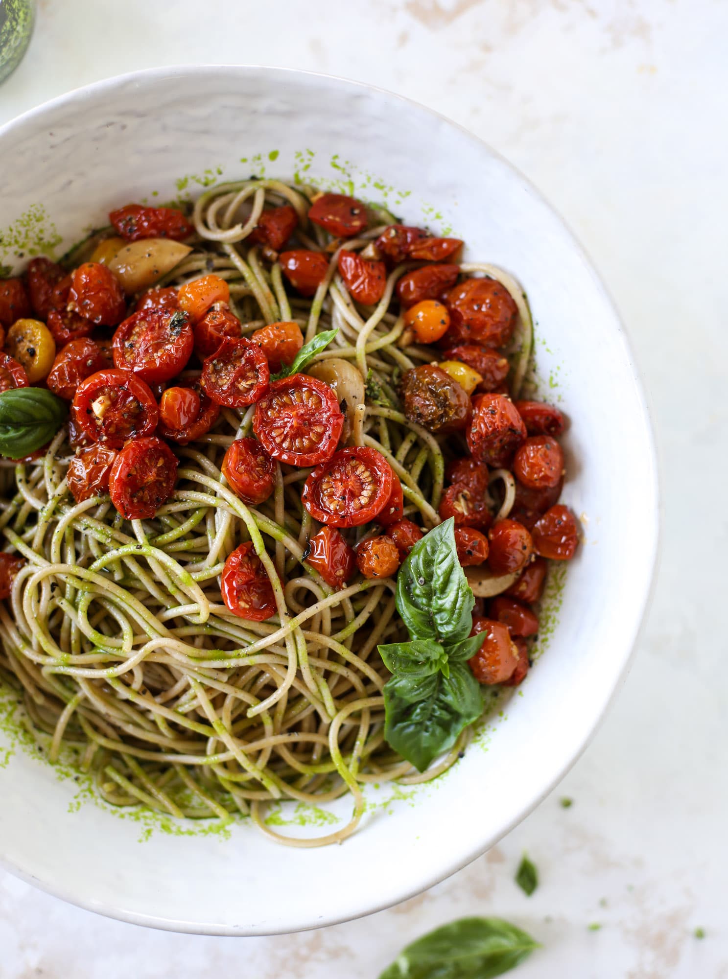 This tomato basil pasta is a labor of love! Made with slow roasted tomatoes, basil oil and tons of parmesan, it's ridiculously full of flavor.