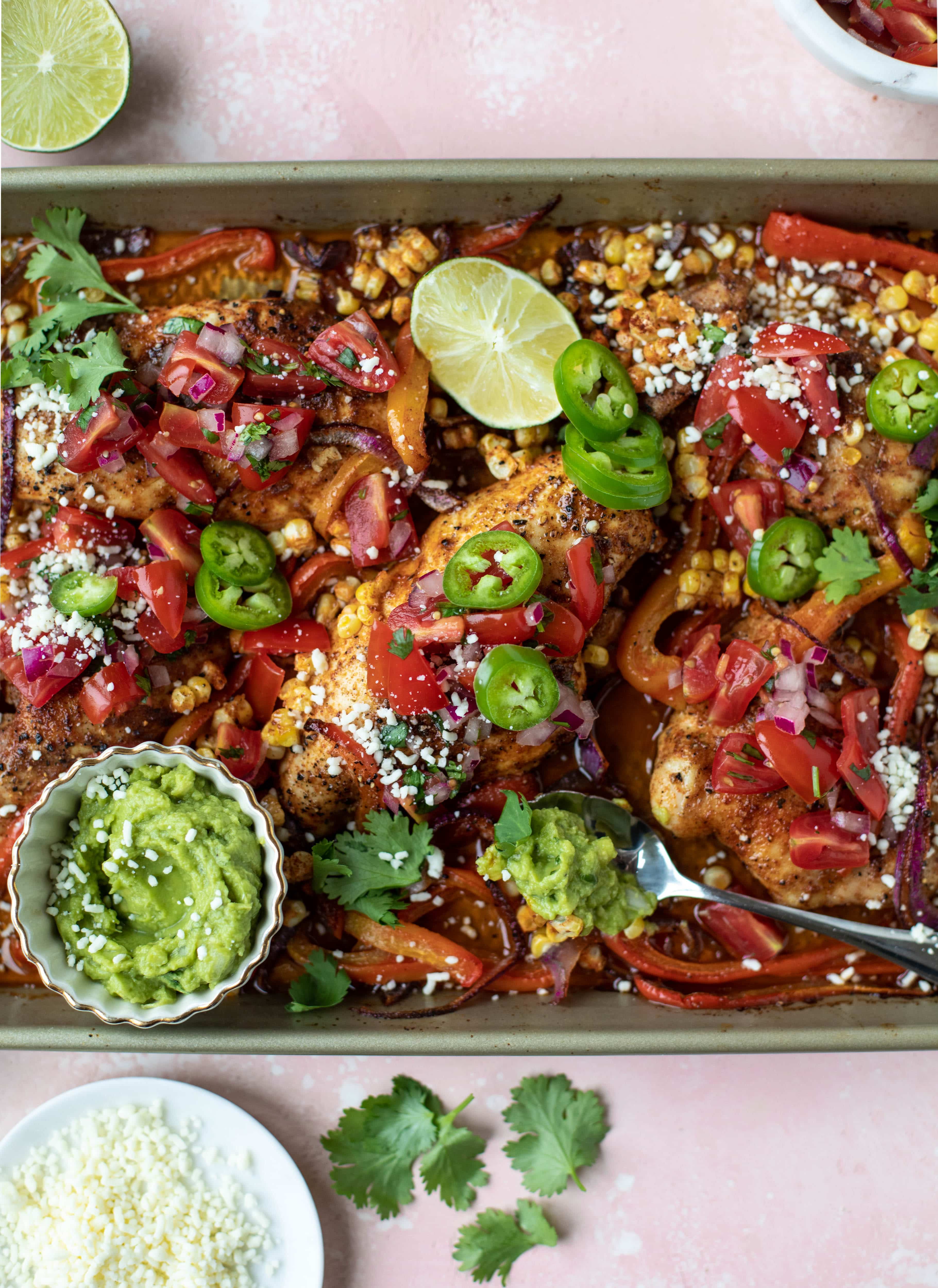 This sheet pan nacho chicken recipe results in the juiciest, more flavorful chicken that can be served in a multitude of ways!