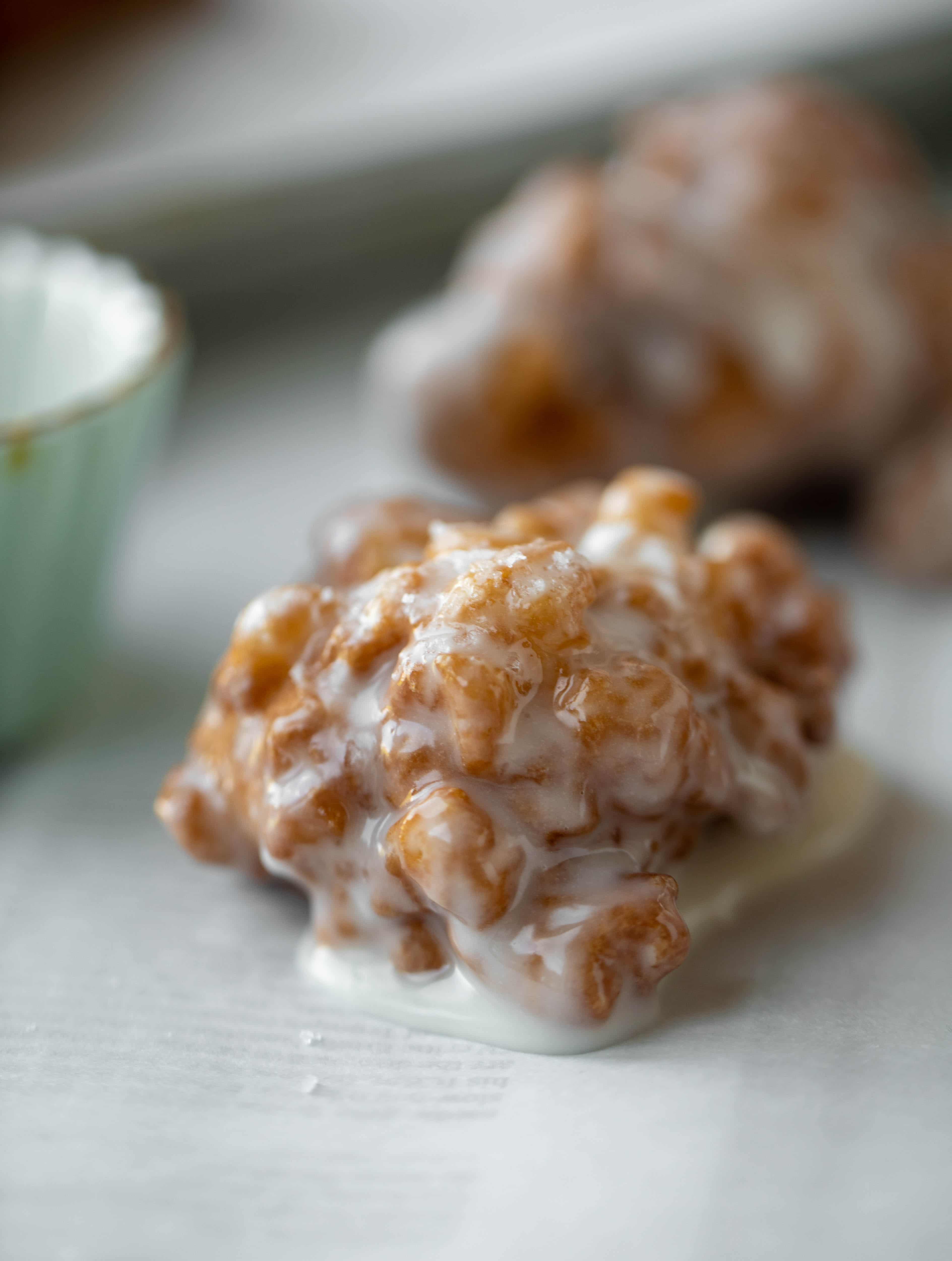 These salted apple fritters use honeycrisp apples and flaked sea salt for a fall flavor explosion. These are the best treat ever!