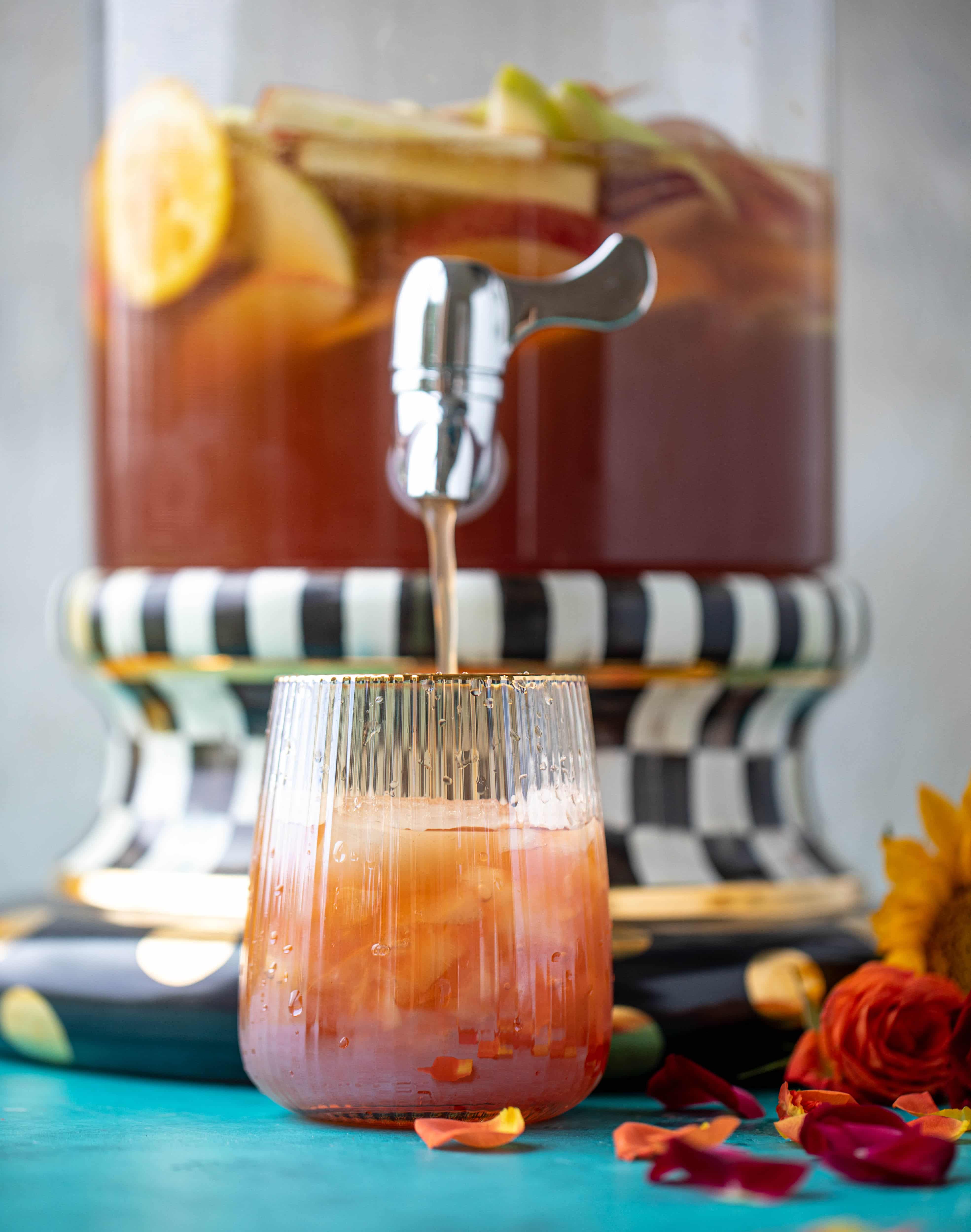 This apple cider punch recipe has tons of fall flavor! Apple cider, aperol, pomegranate soda and prosecco come together to create a bubbly treat!