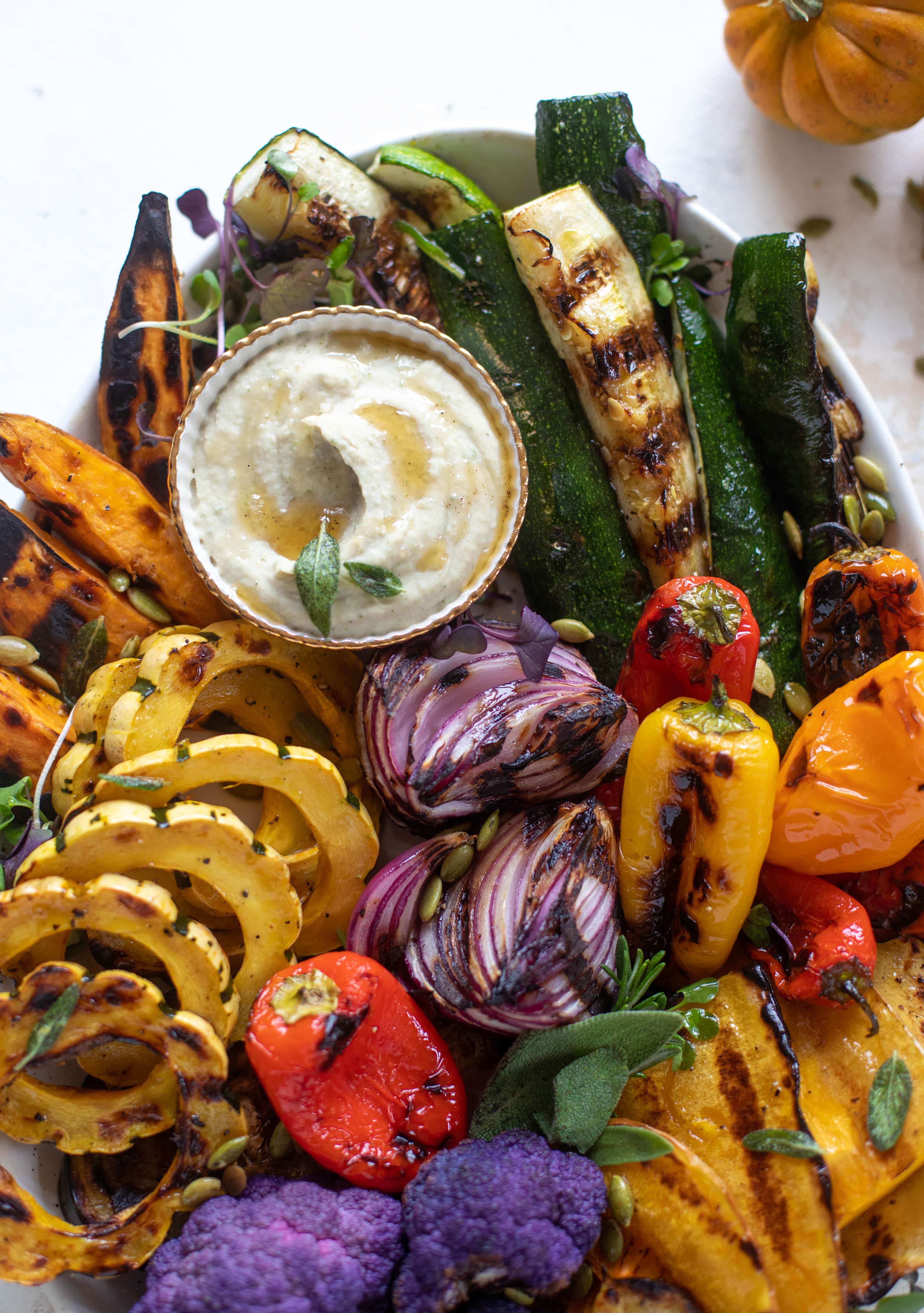 These grilled autumn vegetables make the best side dish or appetizer! Especially when served with the sage brown butter white bean dip. YUM.