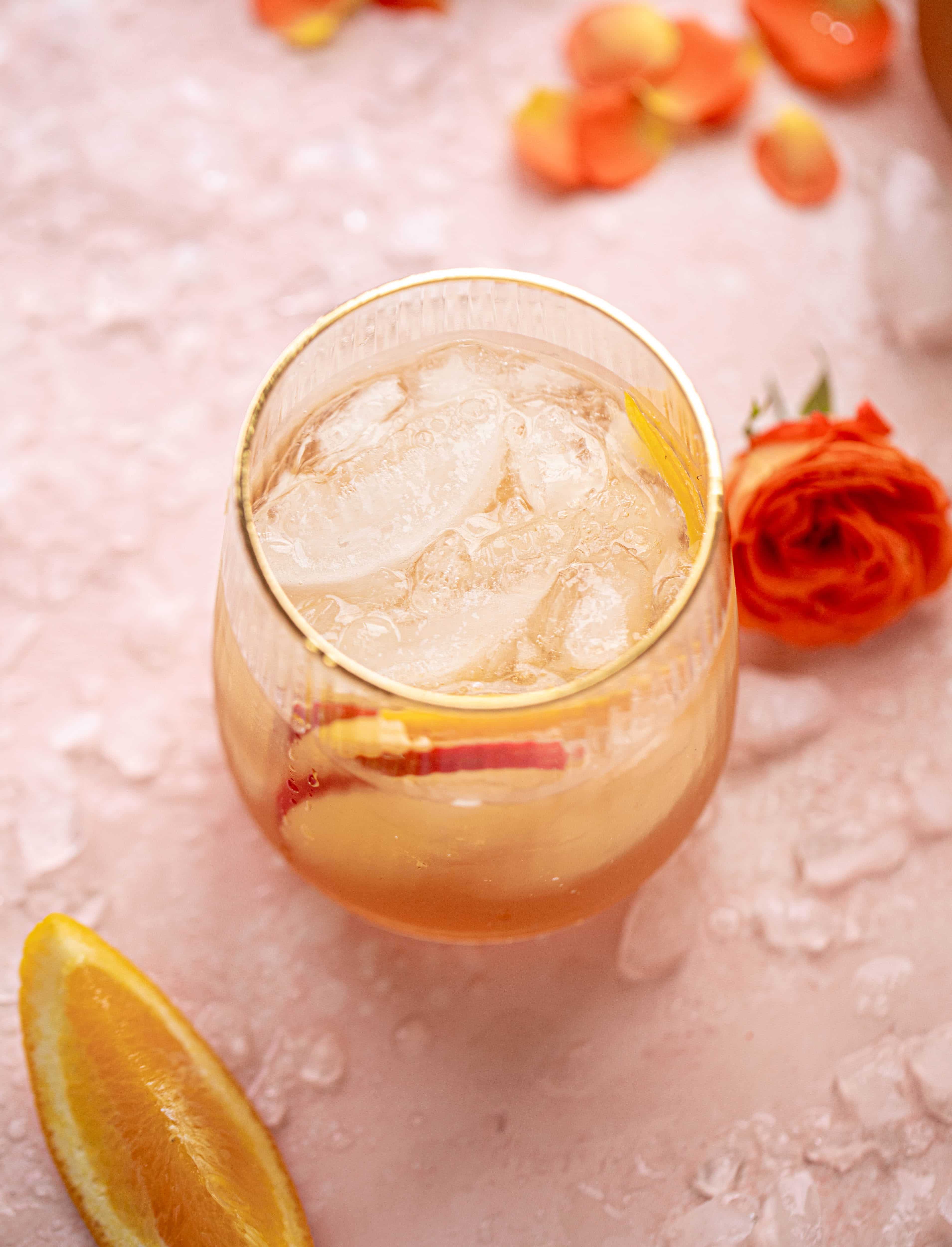 This apple cider spritz is an autumnal take on the classic aperol spritz. Apple cider, prosecco and aperol come together in this refreshing cocktail! 