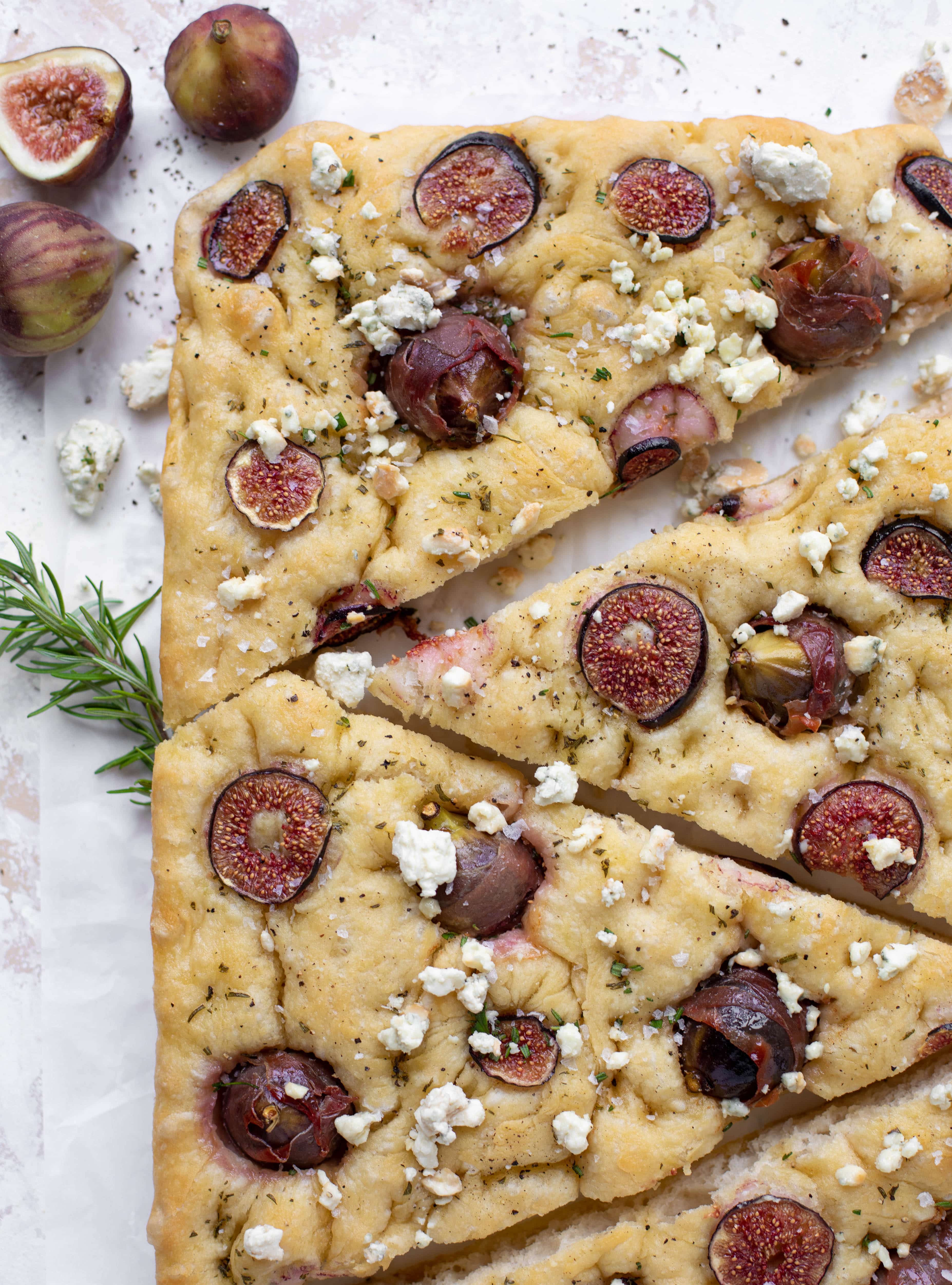 This stuffed fig focaccia bread is such an amazing way to use figs! Golden, toasty, salted focaccia studded with fig jewels. It's delicious and pretty!