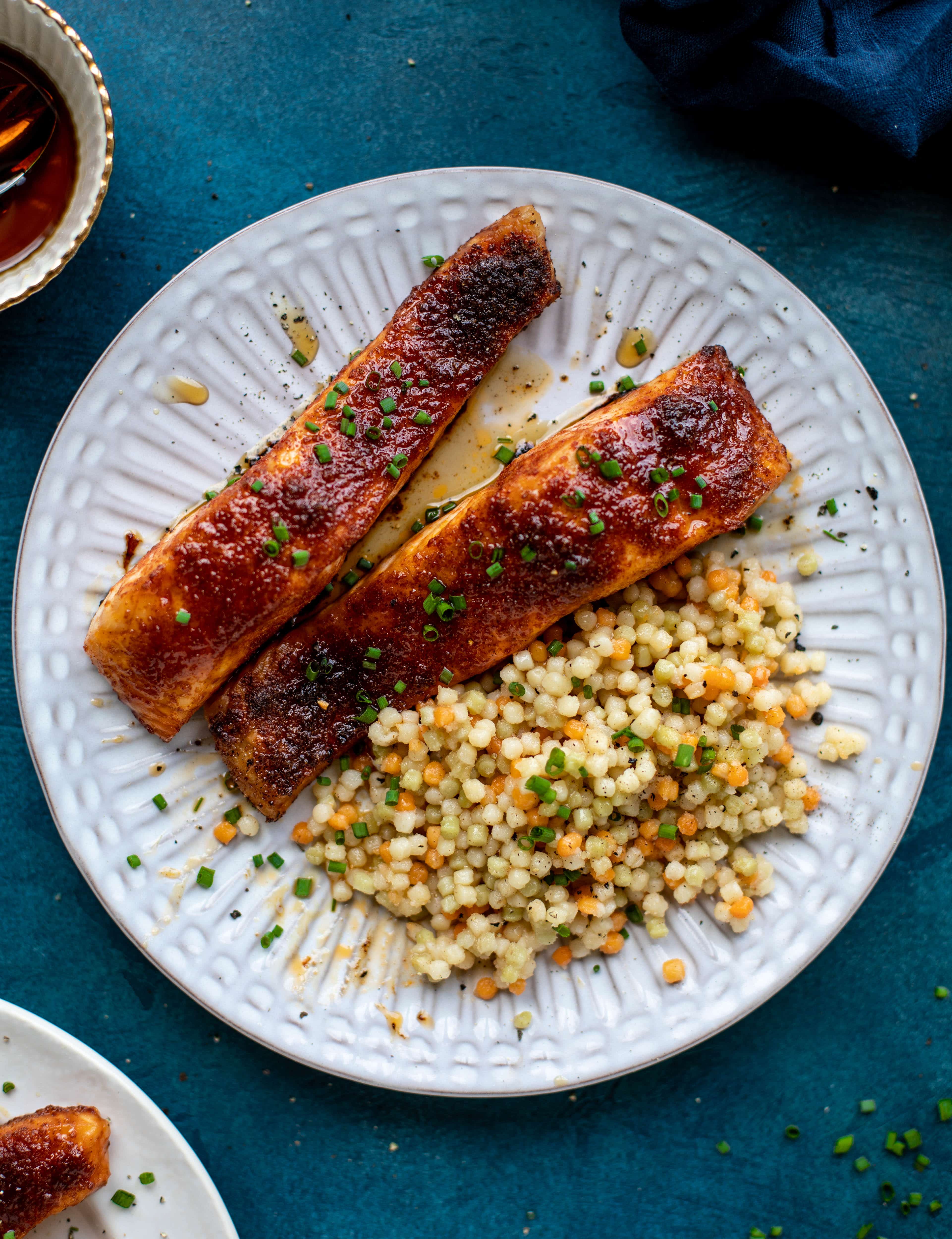 This maple bbq salmon is a quick and delicious weeknight meal. Serve with brown butter couscous and your favorite veg to round it out!